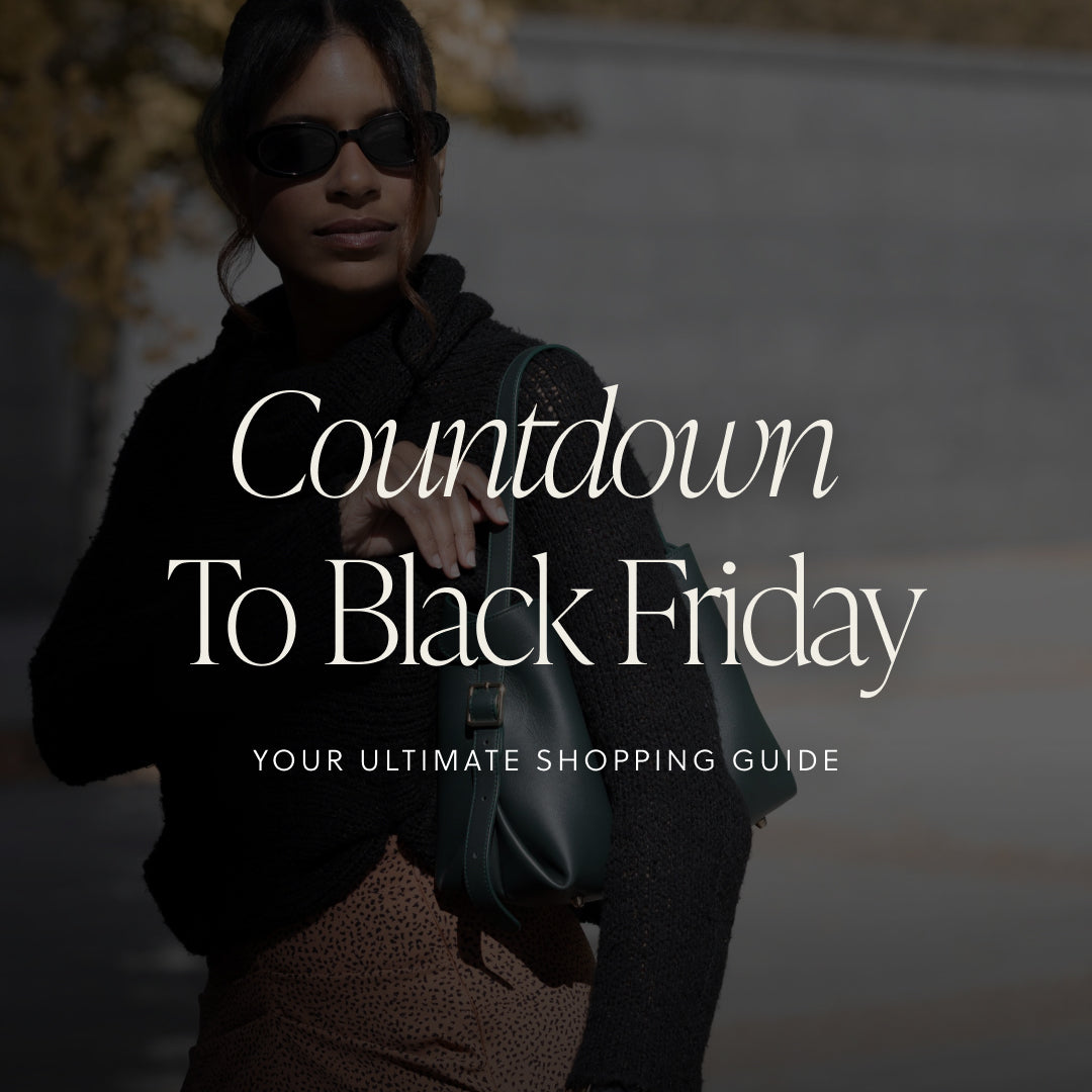 A stylish woman wearing sunglasses holds a Valencia Bag, accompanied by a text overlay that reads: 'Countdown to Black Friday: Your Ultimate Shopping Guide.'