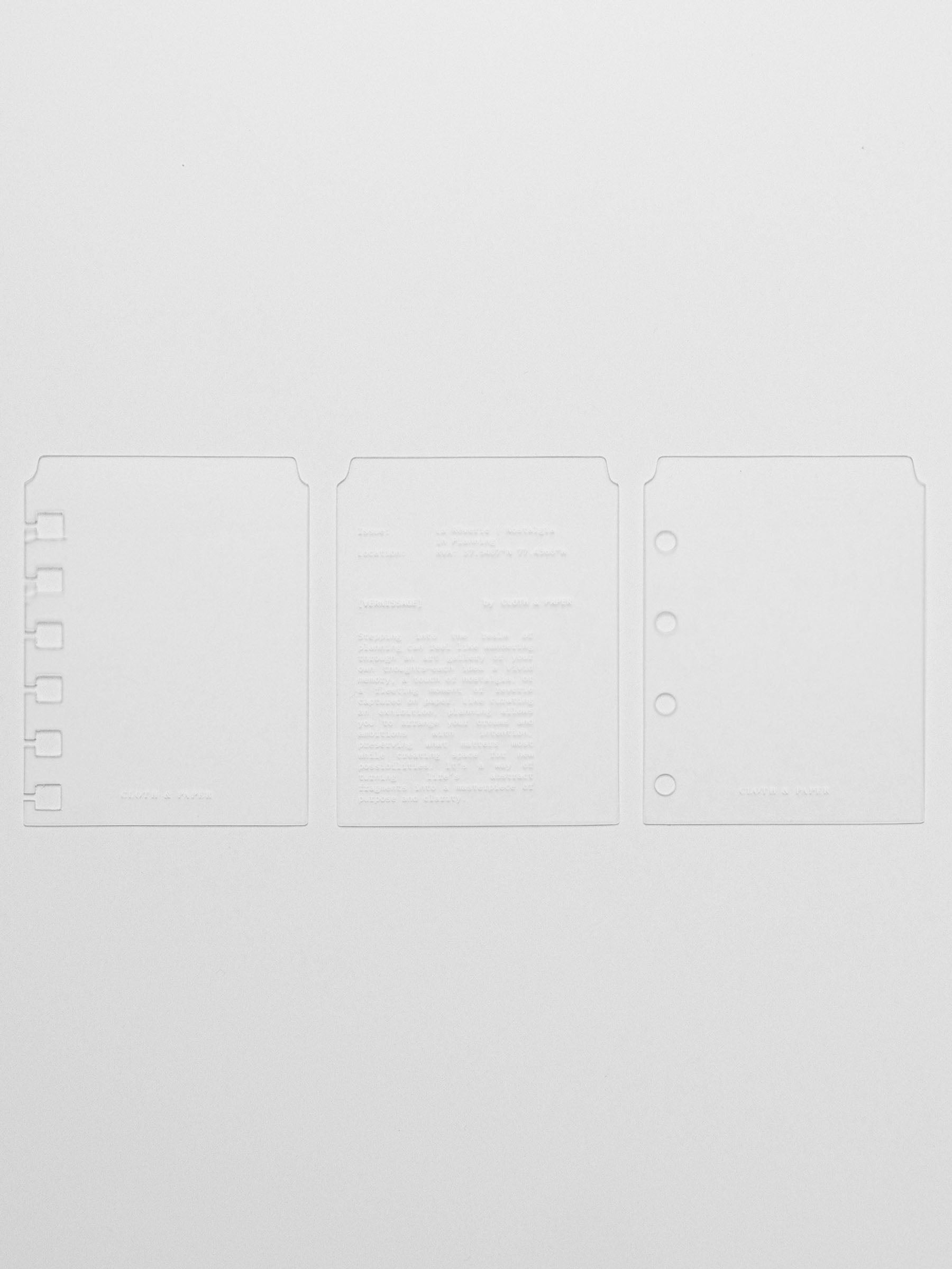 Set of three page markers including spiral punch, unpunched, and hole punched for ring bound planners.