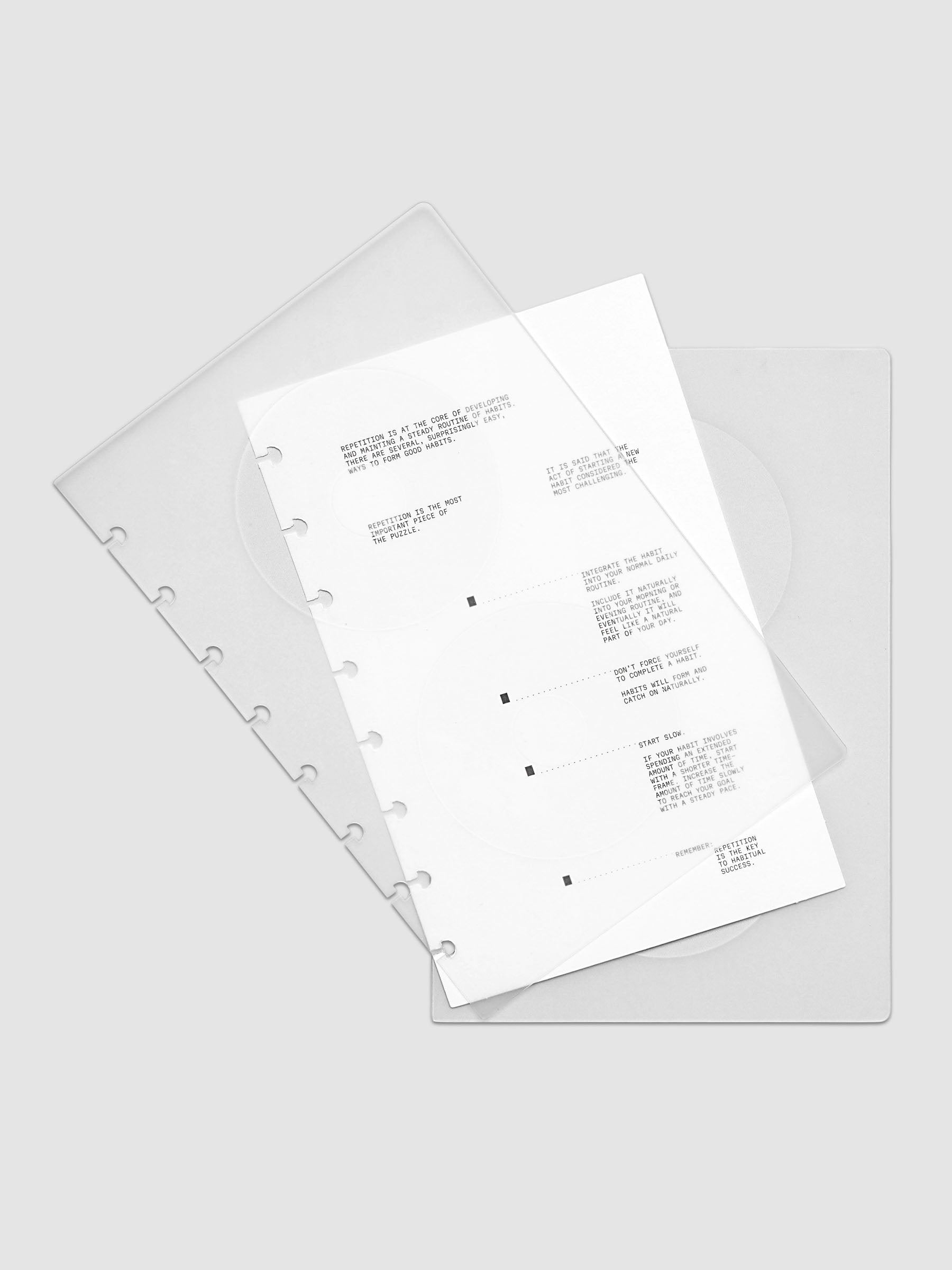 On Repeat Planner Cover + Dashboard Set shown fanned out in size Half Letter, pre-punched for discbound notebooks and planners.