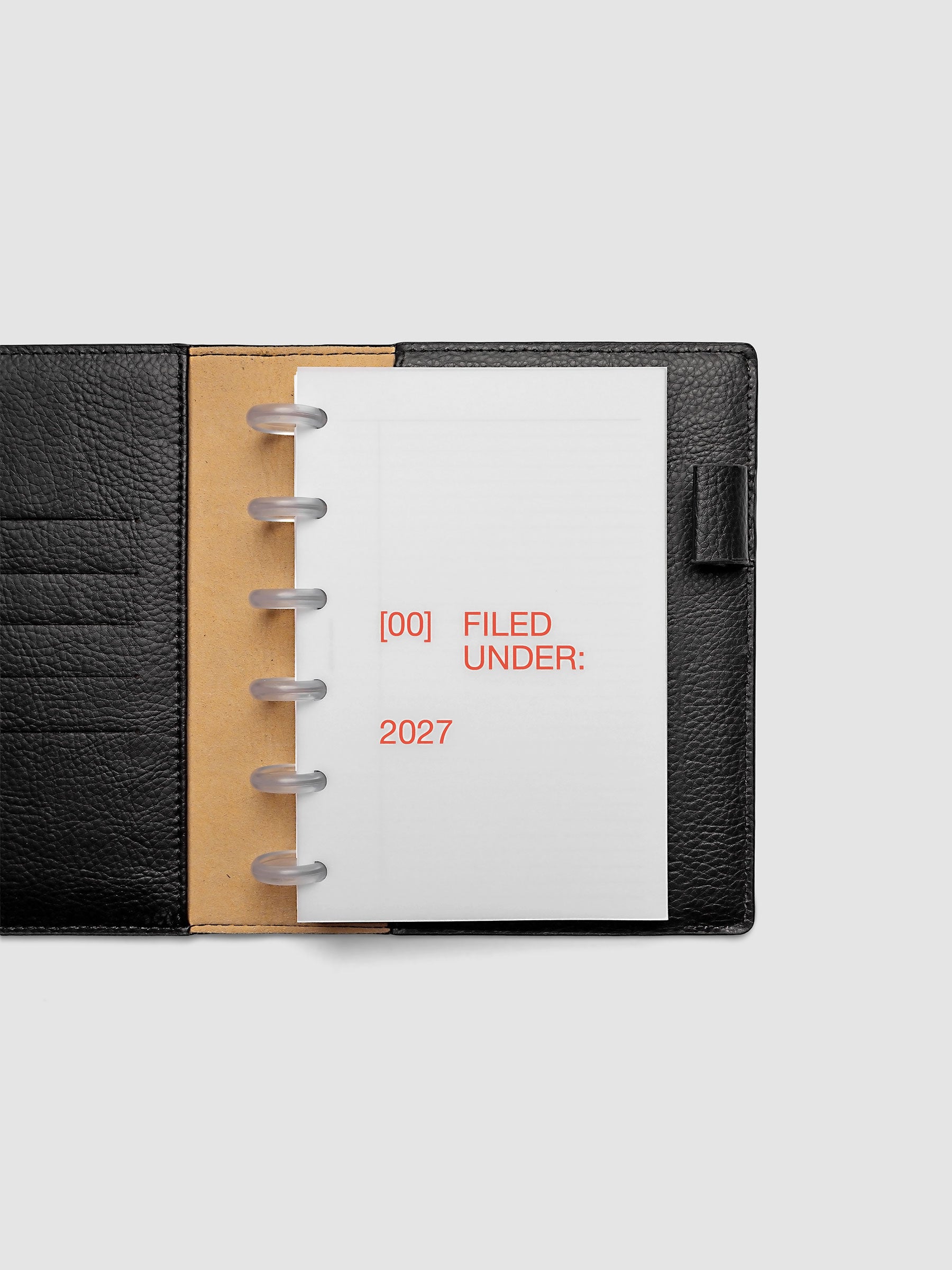2027 Front + Monthly Dashboard Overlays, Saffron, CP Petite 6-Disc Punch, vellum dashboard overlay shown layered inside a planner