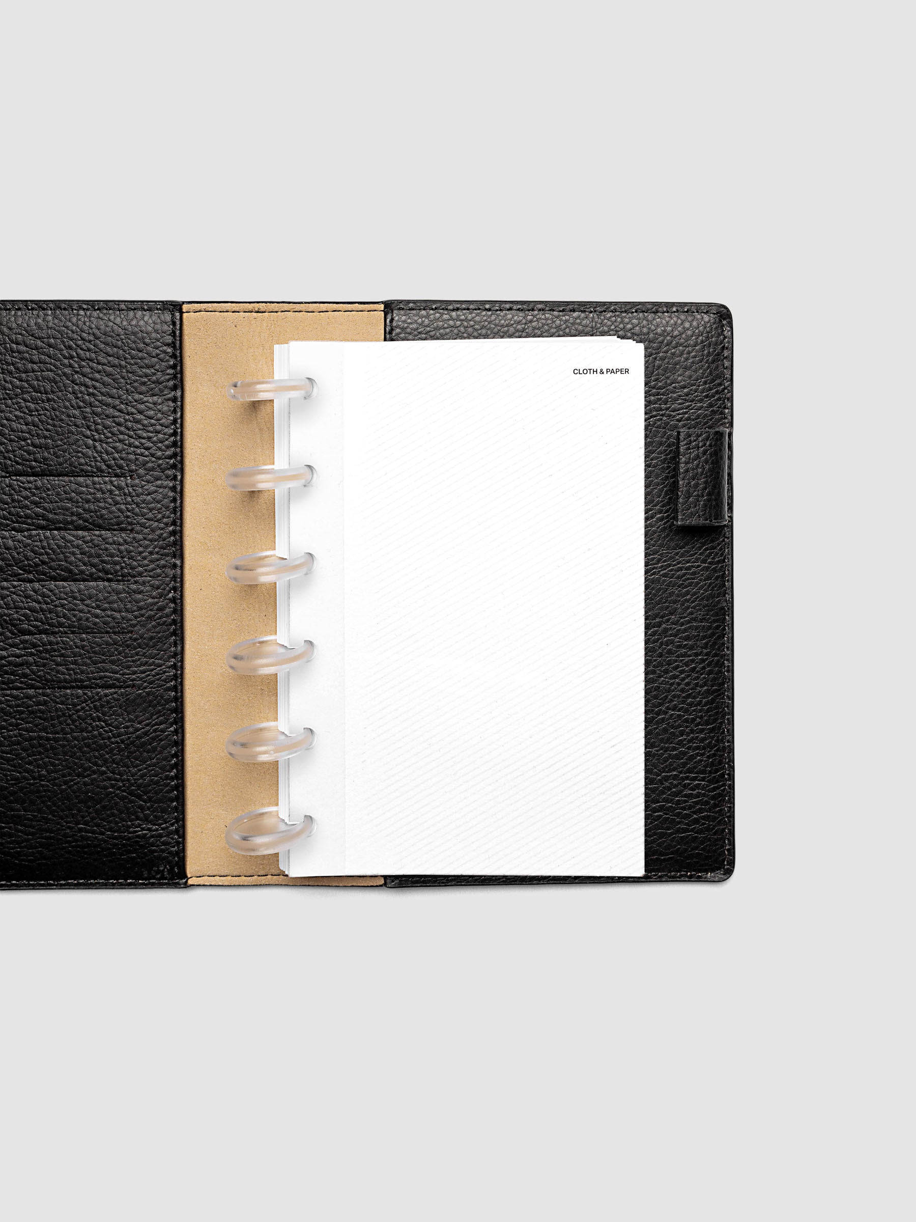 Folded Collage Planner Dashboard, CP Petite 6-Disc Punch, dashboard shown inserted in a planner