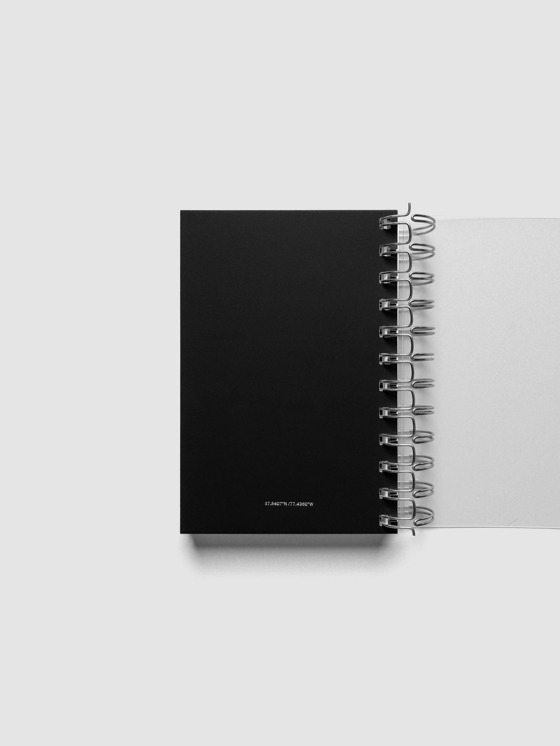 Spiral Notebook dashboard in the color Avant Garde shown in size CP Petite inside a notebook.