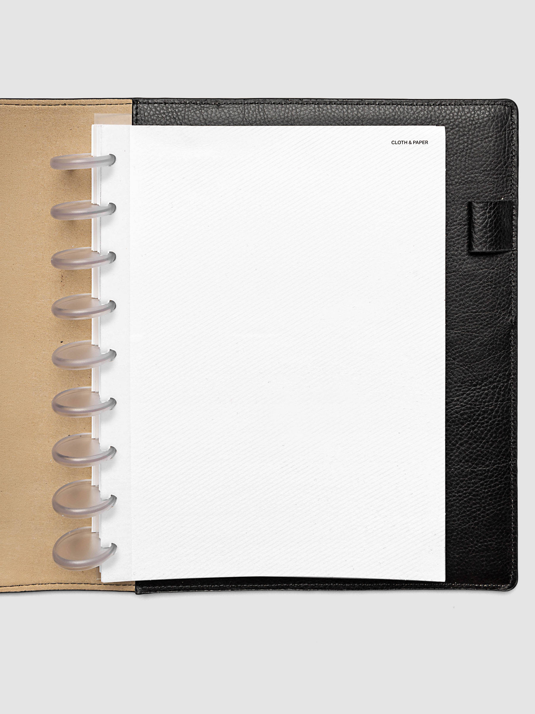 Folded Collage Planner Dashboard, HP Classic 9-Disc Punch, dashboard shown inserted in a planner
