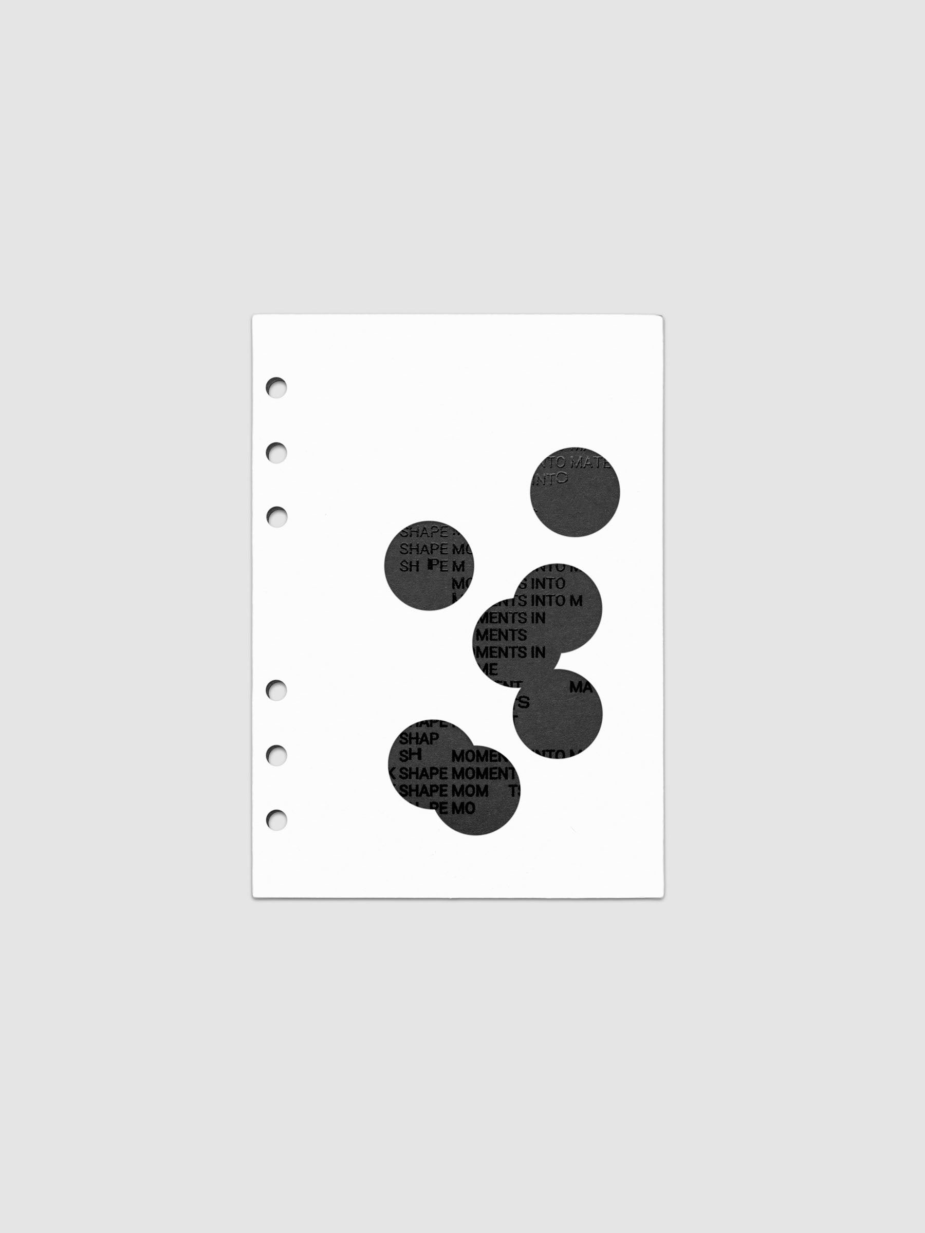 Black and white Ink Blot Planner Dashboard Duo shown layered in size Personal Wide, pre-punched for 6-ring planners.