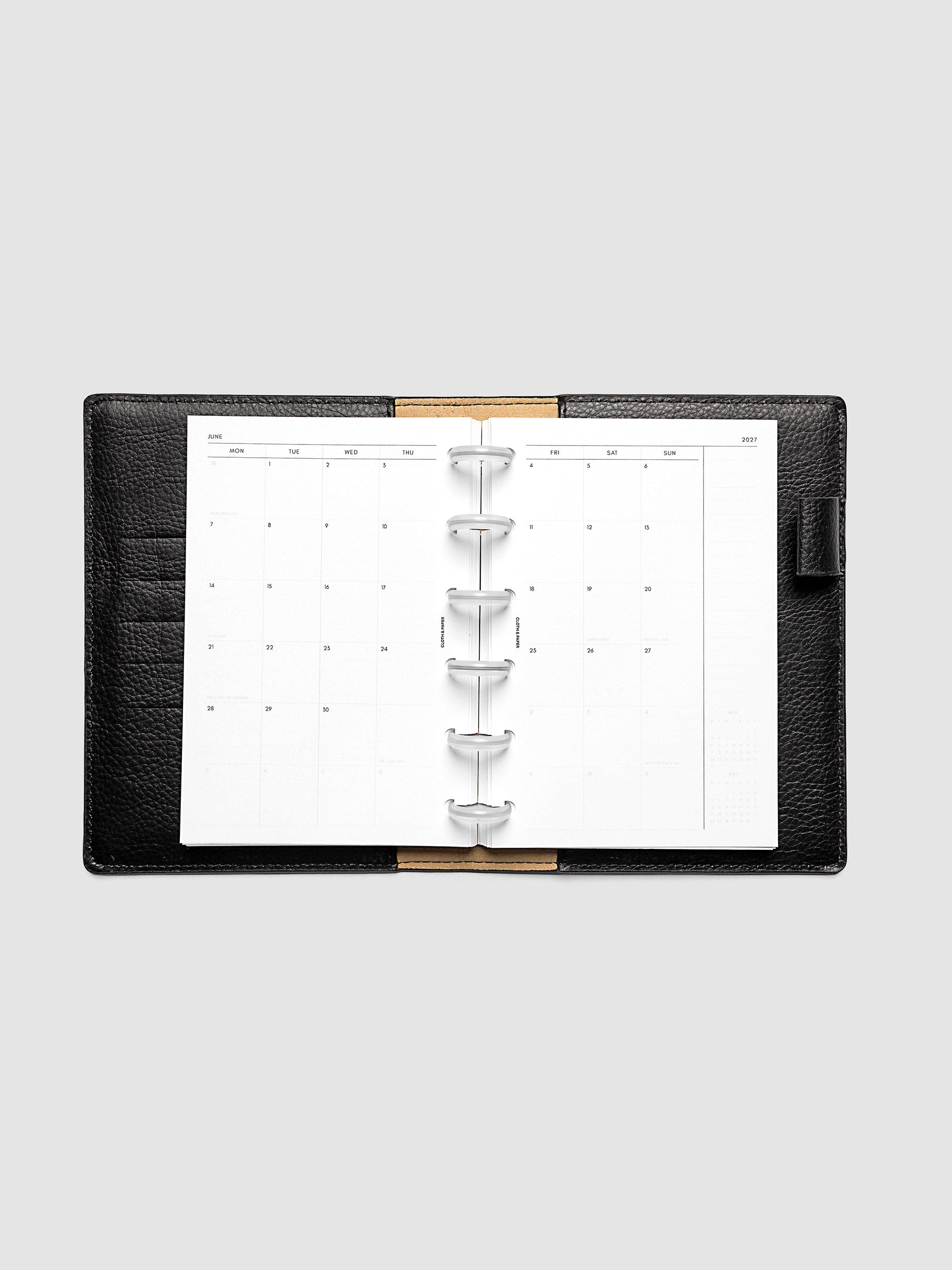 2027 Dated Monthly Planner Inserts, Monday Start, CP Petite 6-Disc Punch, full two-page monthly calendar spread with Monday start, notes column, and mini calendars in the bottom right corner shown inside a planner