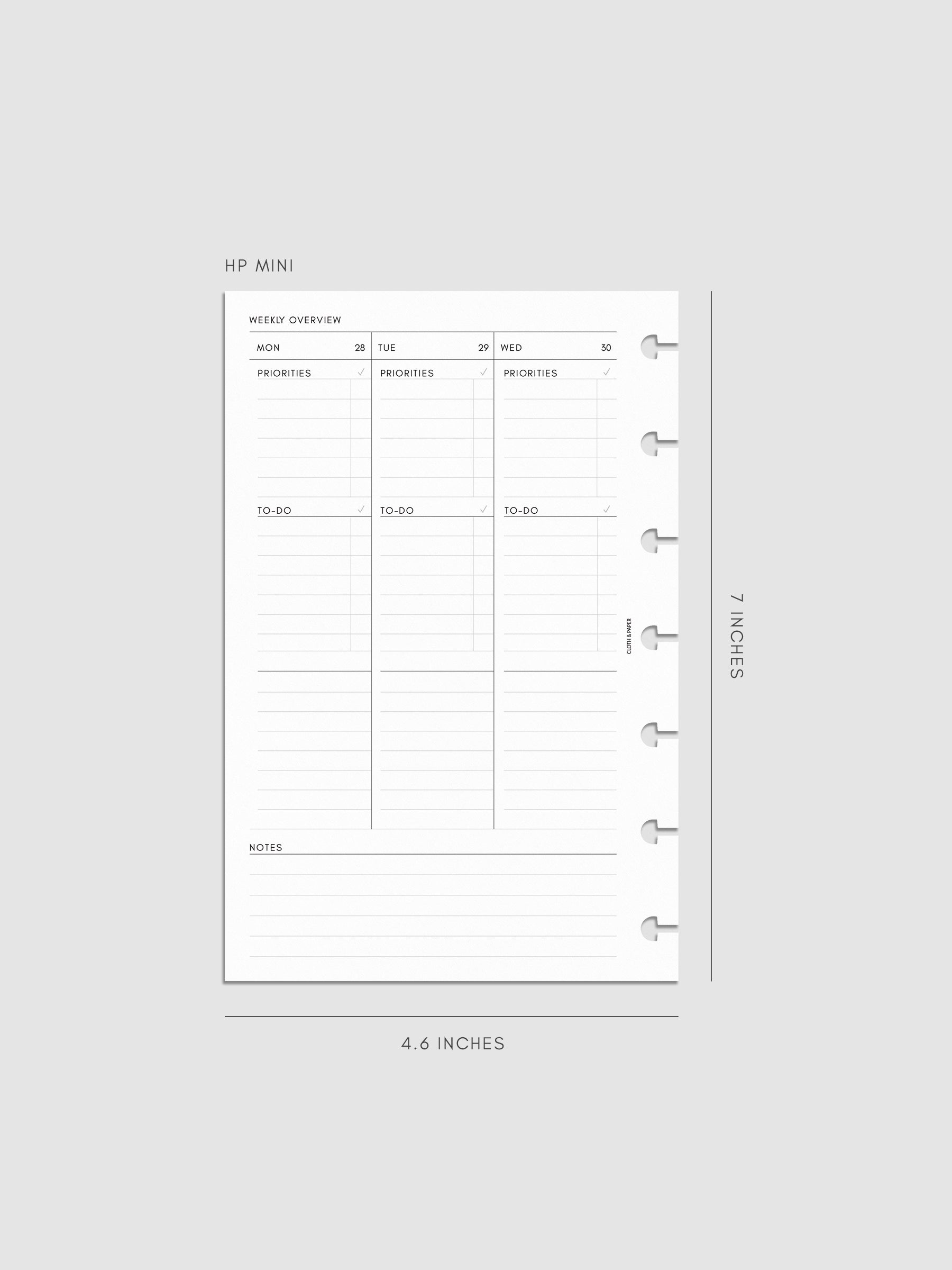 2027 Dated Weekly Task Planner Inserts, Monday Start, HP Mini 7-Disc Punch, left page of weekly spread showing vertical columns for Monday through Wednesday with labeled priorities, to-do, and open notes sections