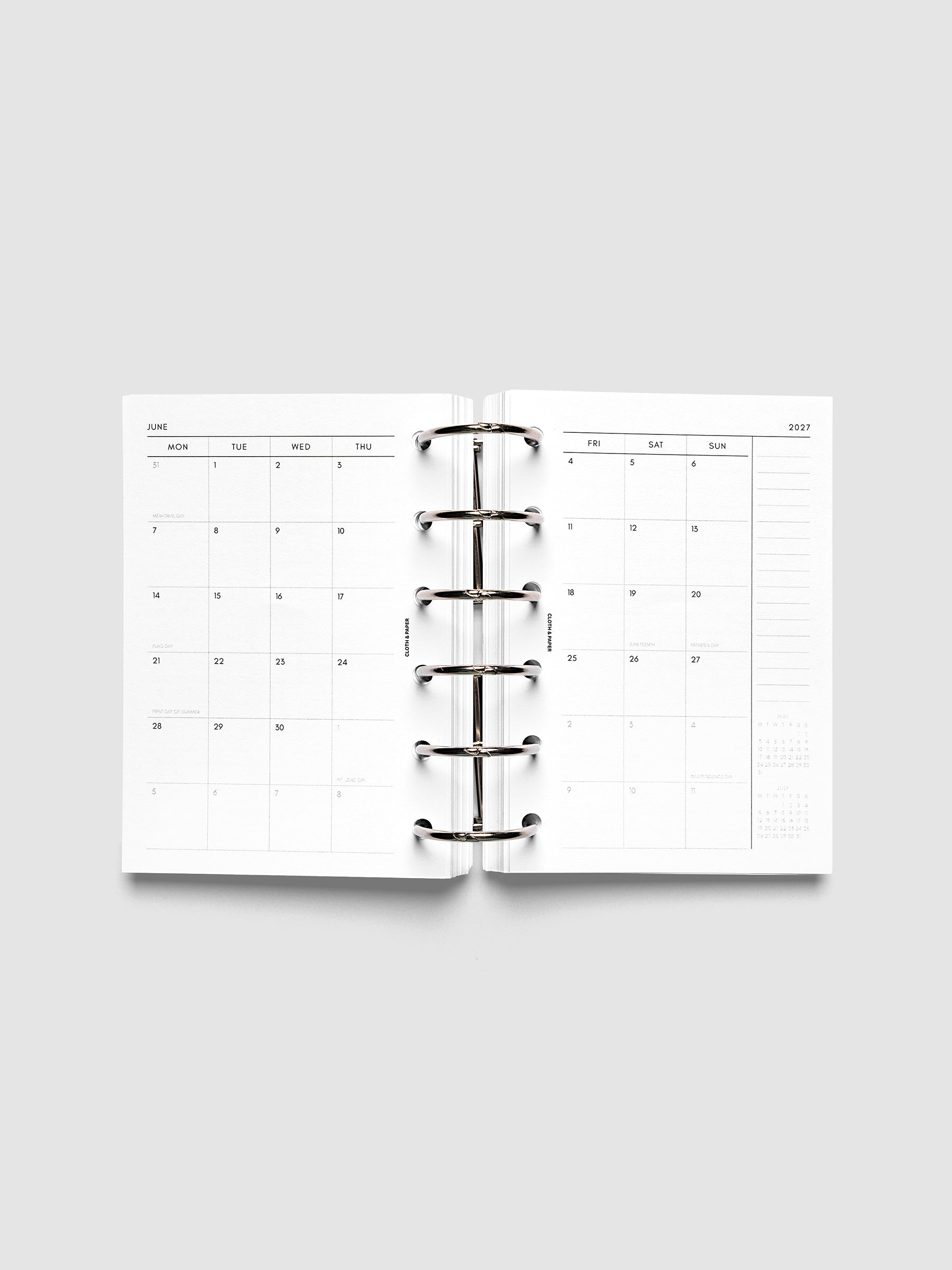 2027 Dated Monthly Planner Inserts, Monday Start, Pocket 6-Ring Punch, full two-page monthly calendar spread with Monday start, notes column, and mini calendars in the bottom right corner shown inside a planner