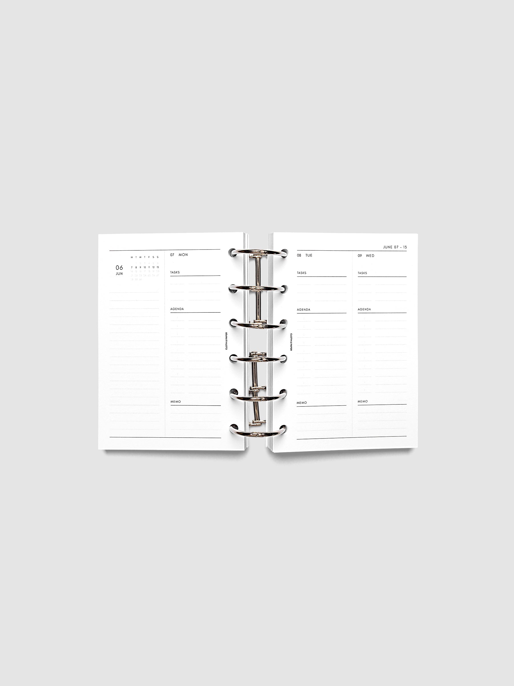 2027 Dated Daily Inserts | Monday Start in size Pocket 6-Ring Punch inside a black planner cover