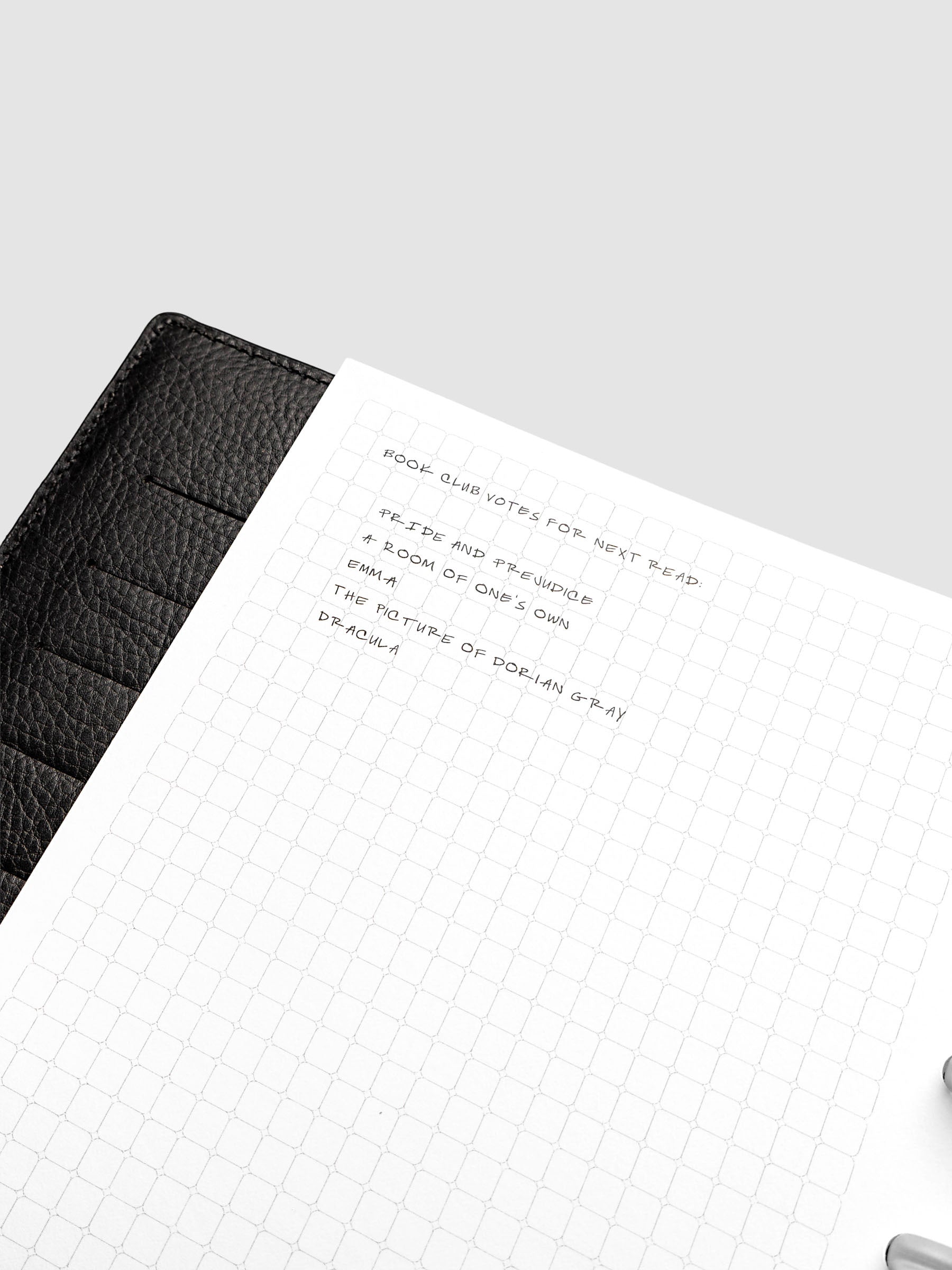 Rounded Graph Planner Insert Half Letter 8-Disc Punch close-up of left page grid layout