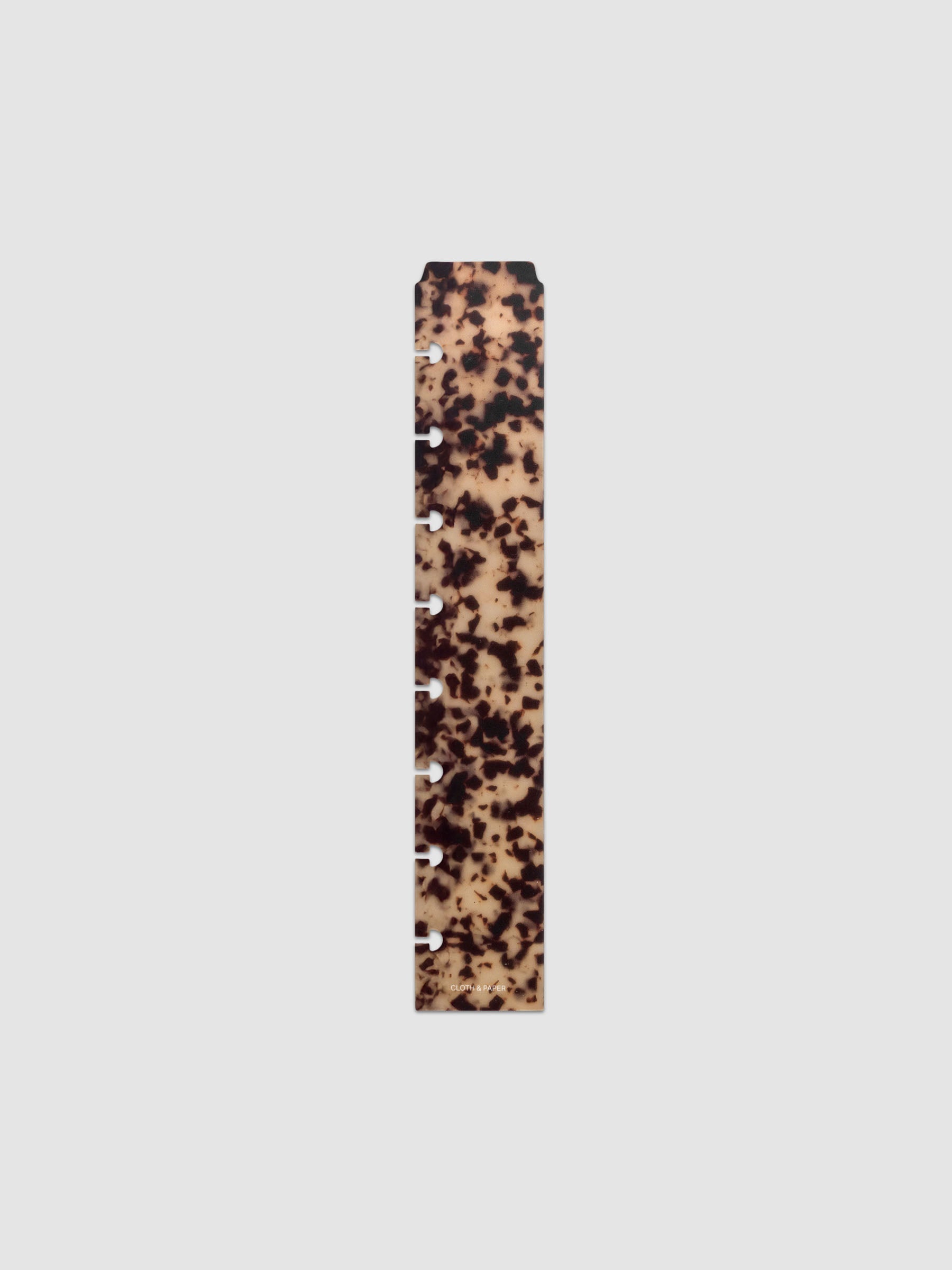 One narrow page marker in tortoiseshell pattern, shown in size Half Letter.