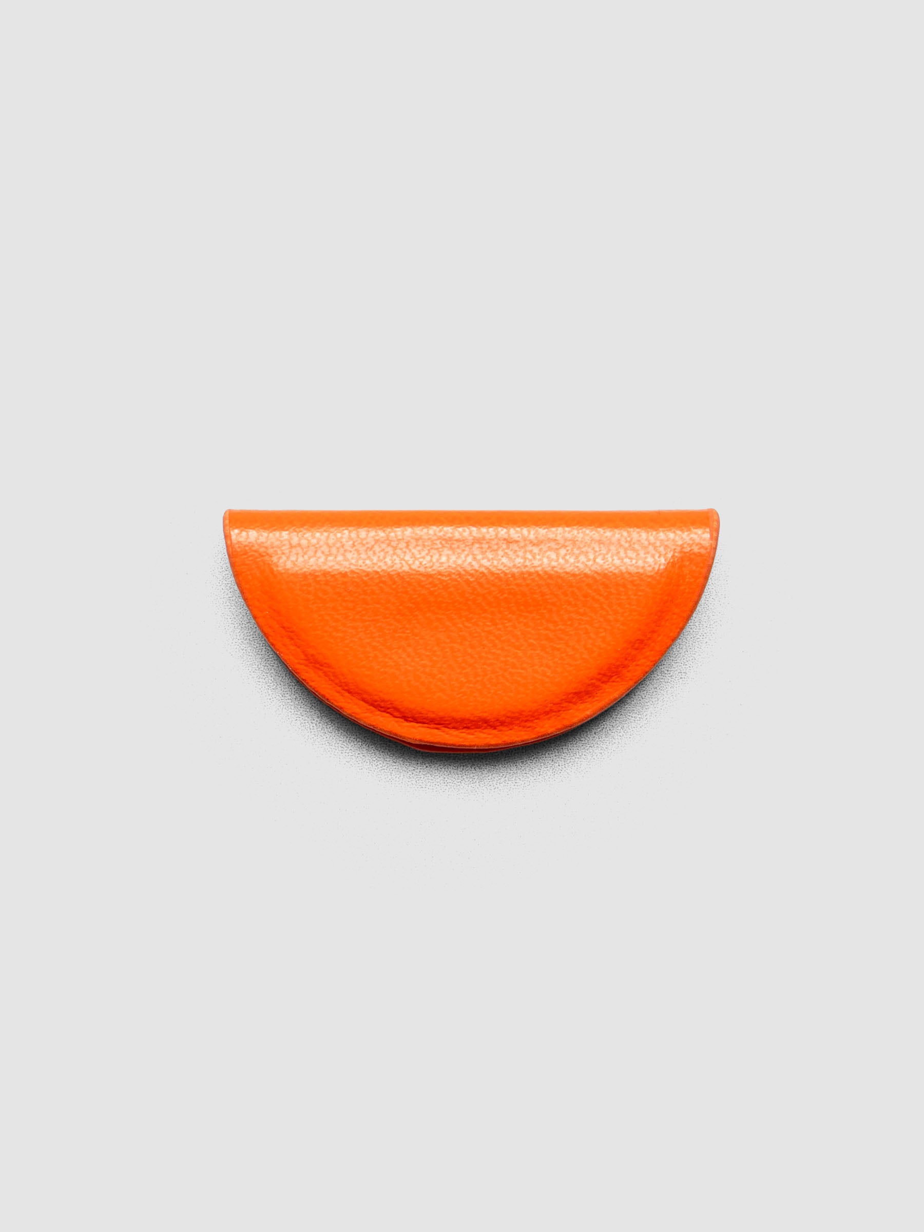 Saffron (orange) mini magnetic bookmark folded in half