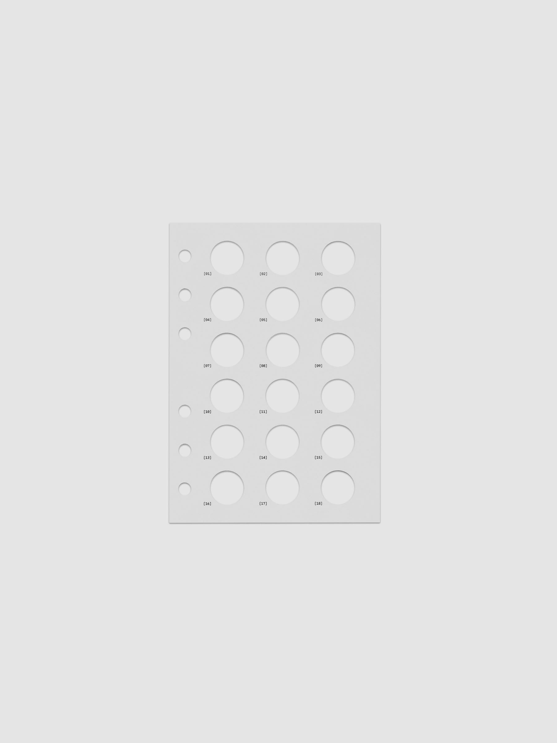 One transparent dashboard with 18 circular cut outs. One piece from the Inner Blueprint Dashboard Duo shown in size A6.