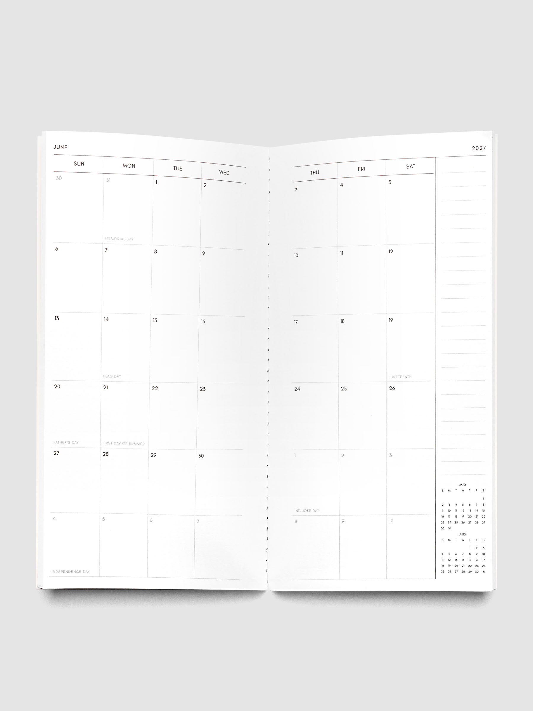 Open 2027 Dated Travel Notebook Monthly in A5 Slim size showing the full two-page dated calendar spread