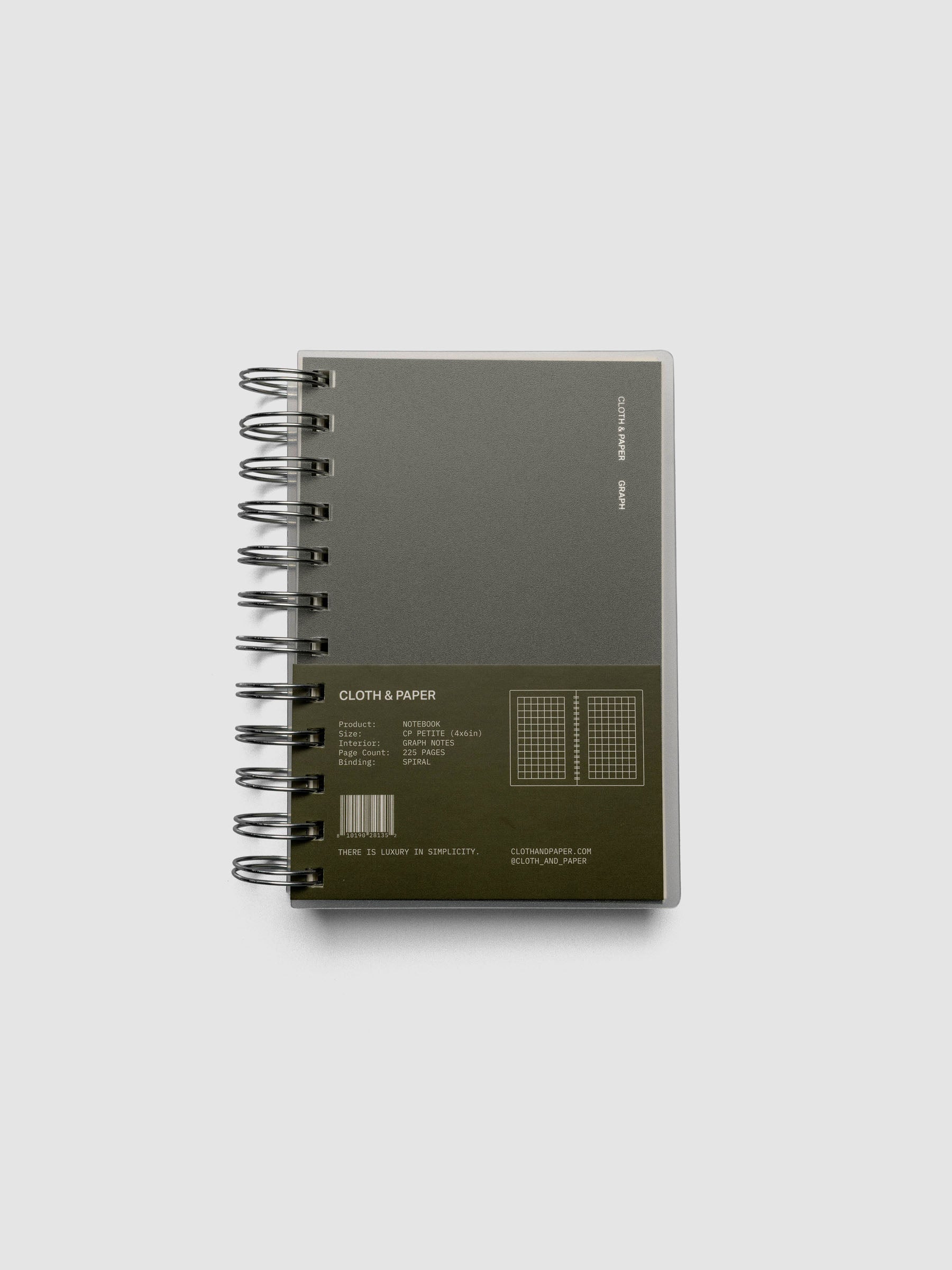Spiral Notebook in size CP Petite and color Olive with Graph Note interior pages shown closed from the front with belly band.