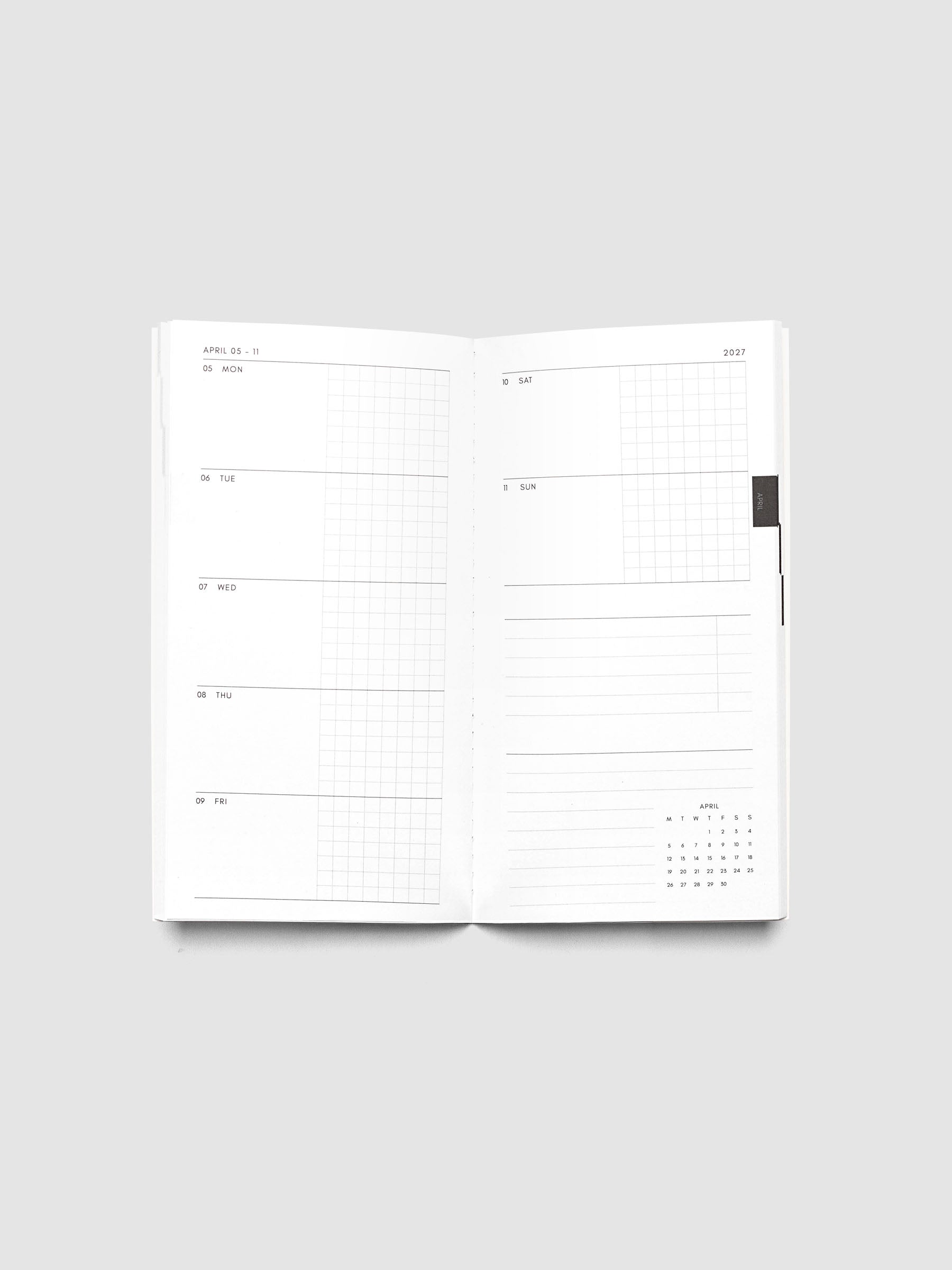 Open Jan–Jun 2027 Dated Travel Notebook showing the full weekly spread, with split daily columns on the left page and weekend dates, task section, notes section, and month-at-a-glance on the right