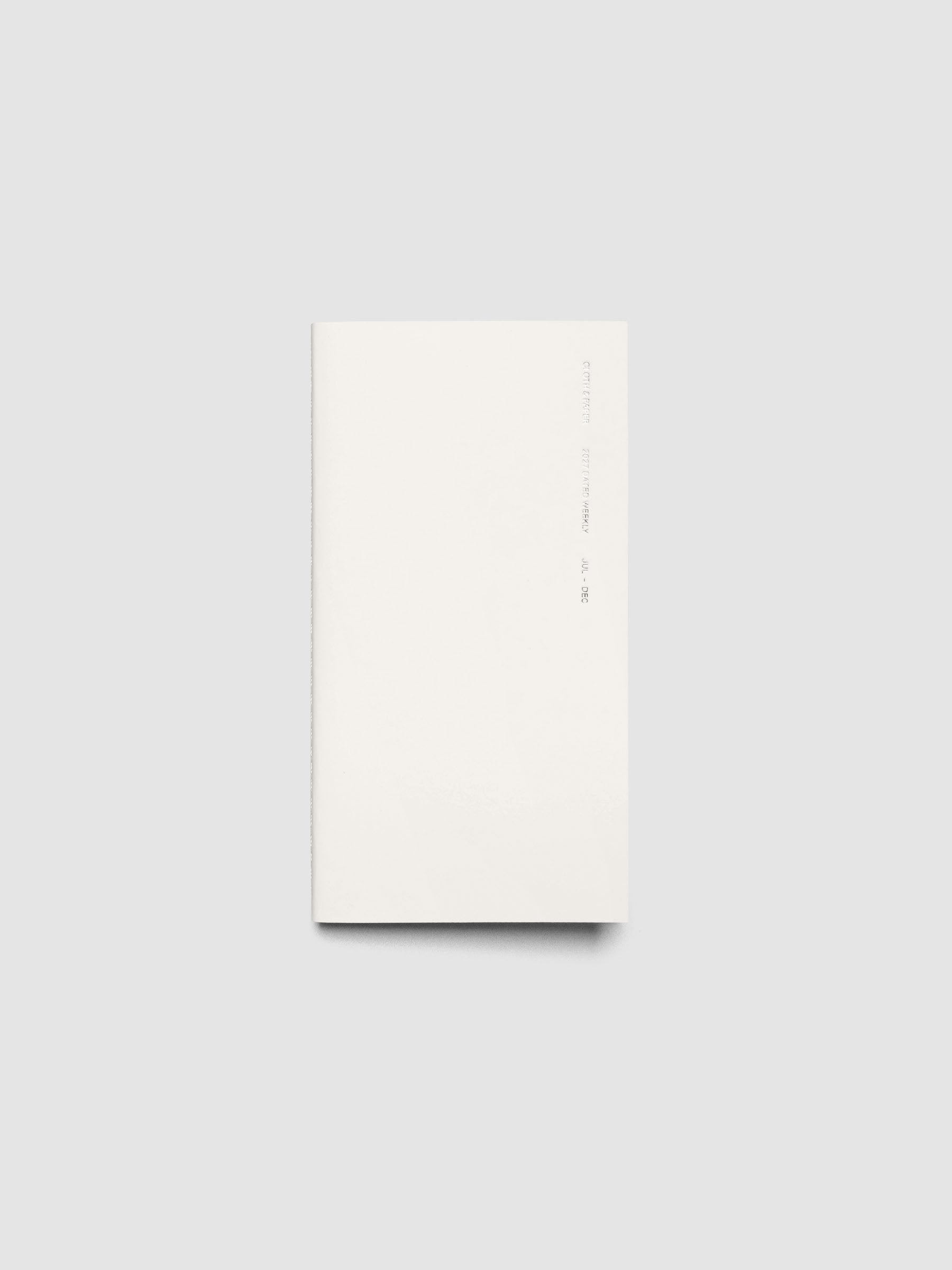 Closed Jul–Dec 2027 Dated Travel Notebook in A5 Slim size, showing the off-white cover with silver foil text