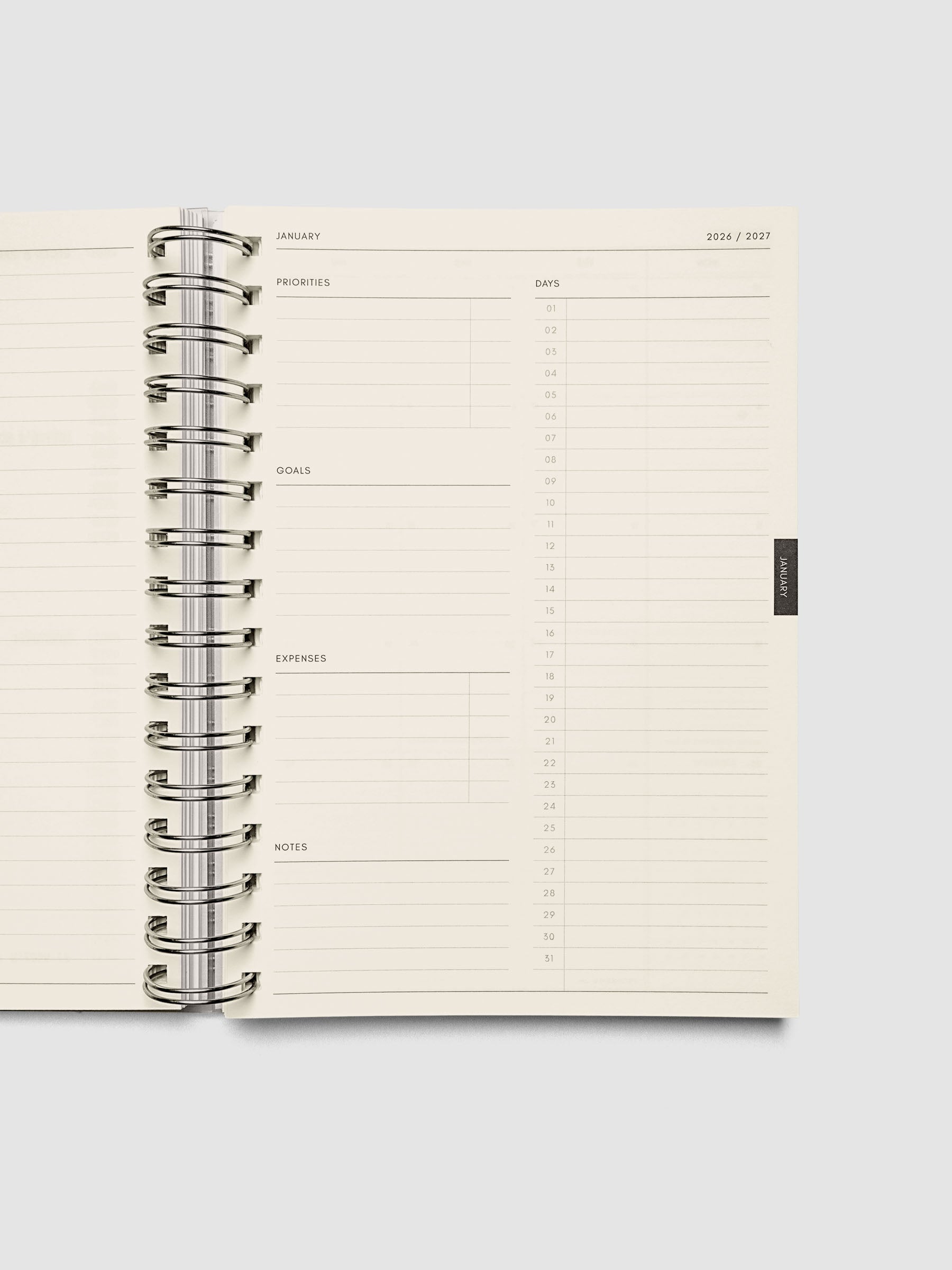 Monthly overview page showing daily planning sections alongside columns for priorities, goals, expenses, and notes, from the 2026–2027 Weekly Horizontal Academic Planner A5 Spiral