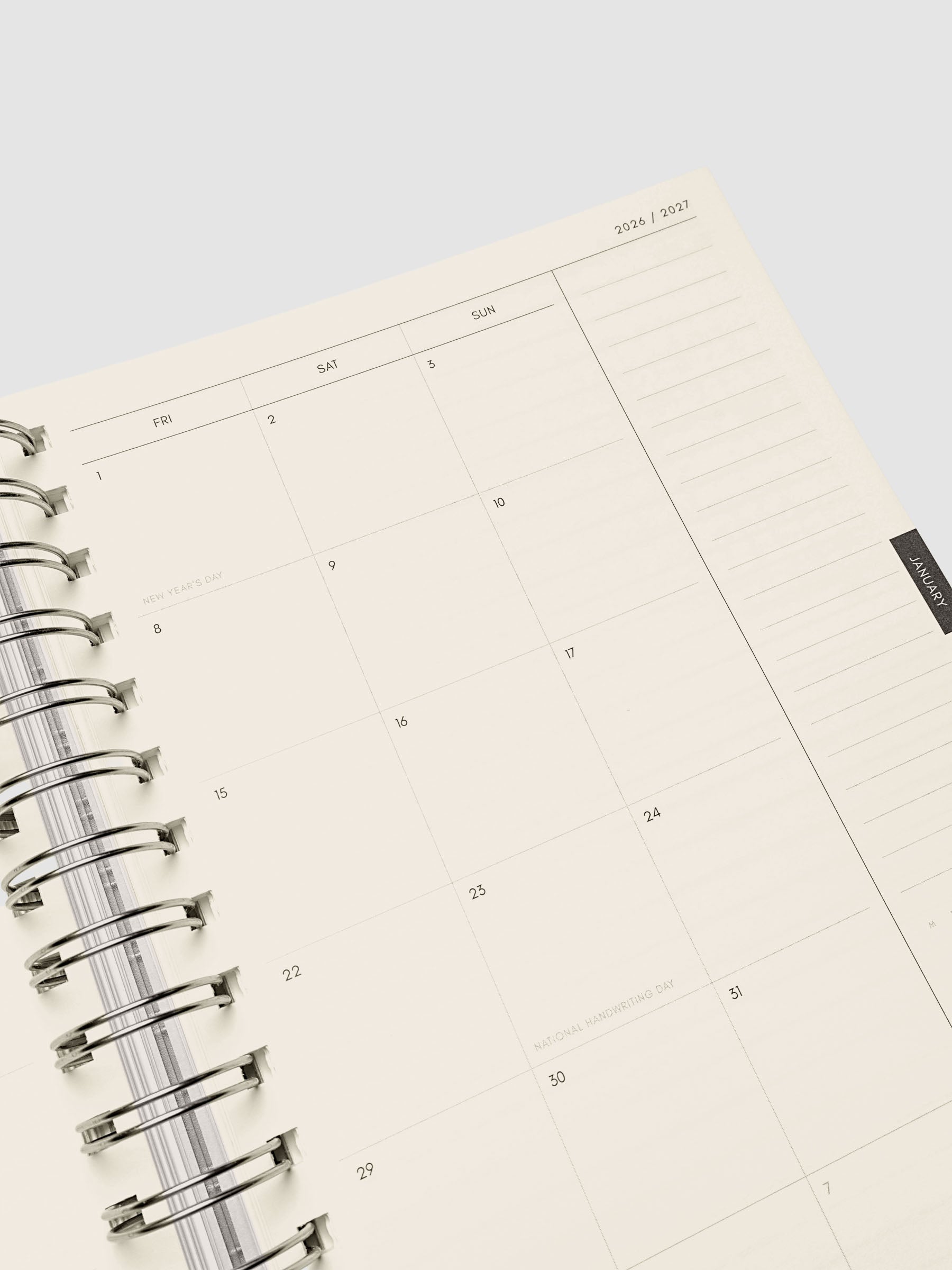 Close-up of the right page of the two-page monthly calendar spread showing the calendar grid with holidays marked, from the 2026–2027 Weekly Horizontal Academic Planner A5 Spiral