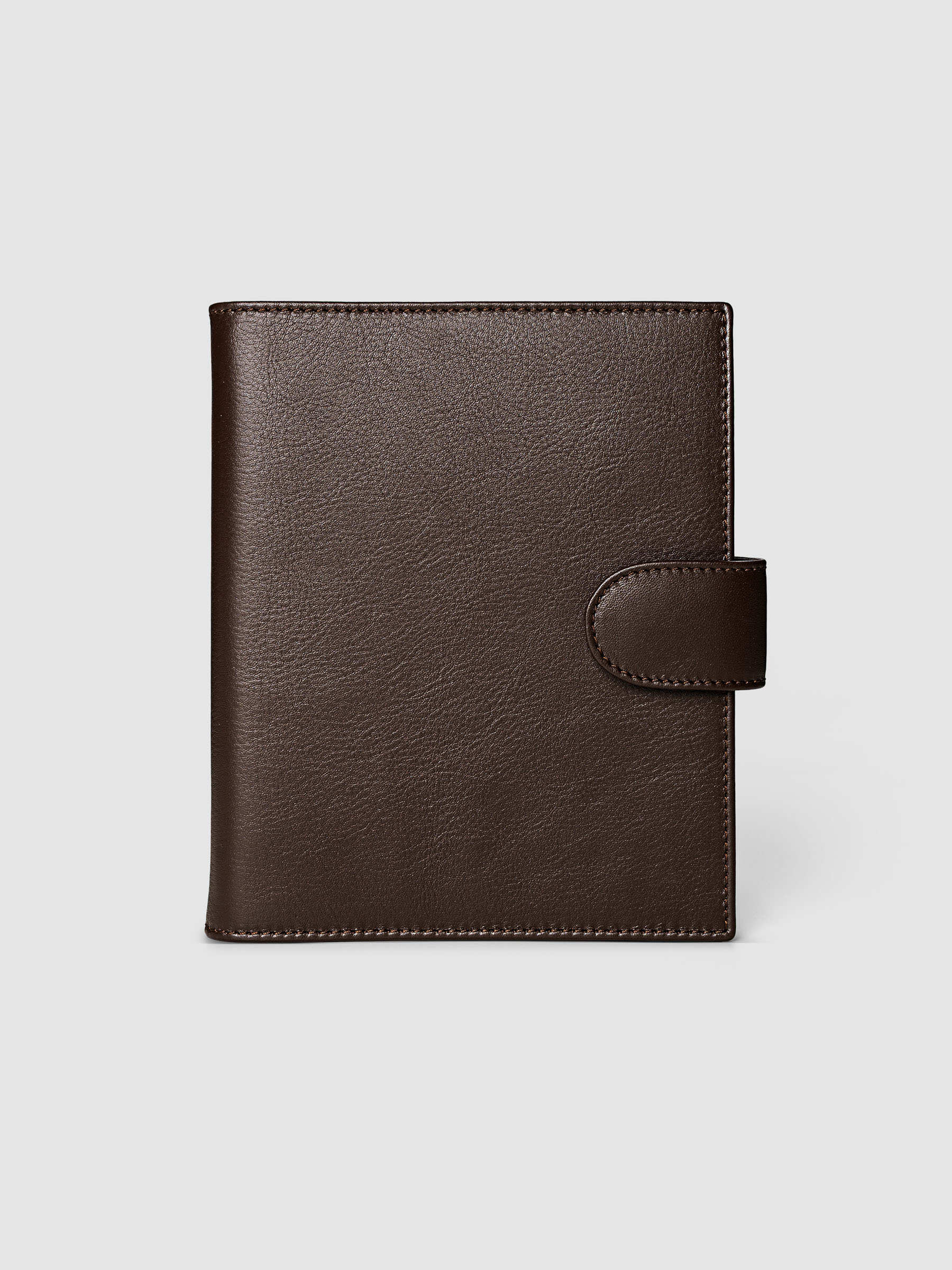 Dark brown genuine leather Personal Wide 6-ring planner cover with gold magnetic snap closure, closed front view