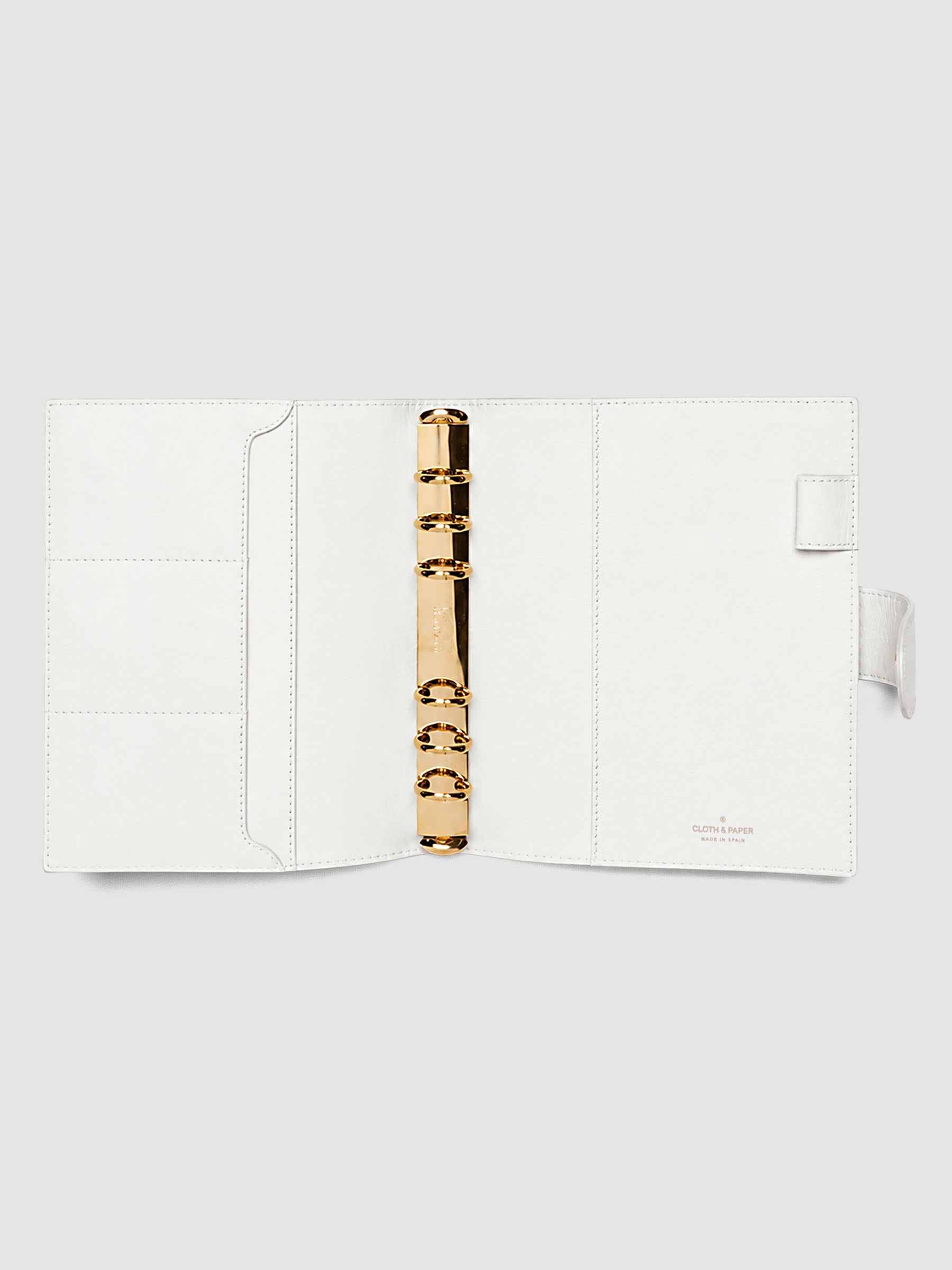 Open off-white genuine leather Personal Wide 6-ring planner cover showing full interior, gold Krause rings and pockets visible on both sides