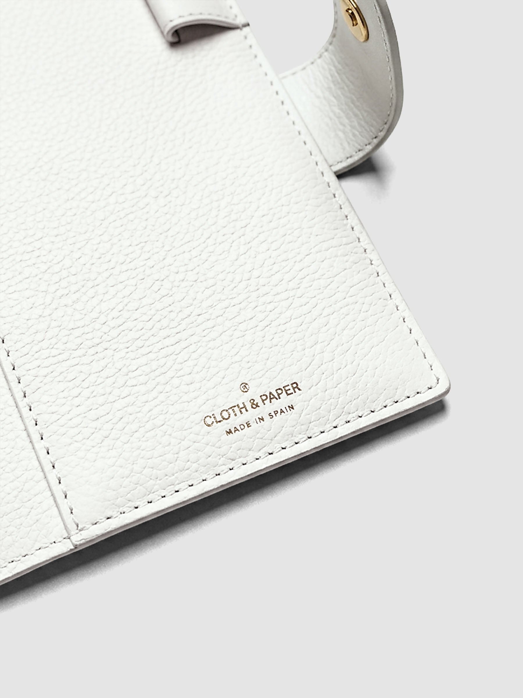 Detail of three credit card slots on the interior of an off-white genuine leather Personal Wide 6-ring planner cover