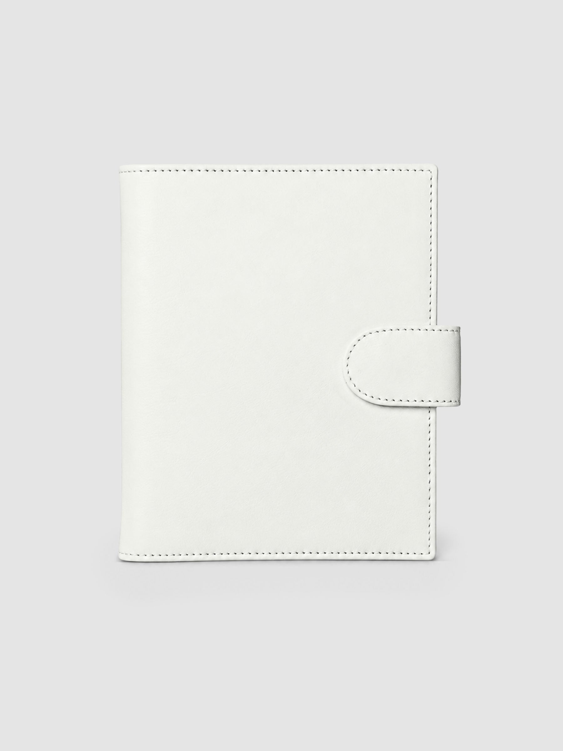 Off-white genuine leather Personal Wide 6-ring planner cover with gold magnetic snap closure, closed front view