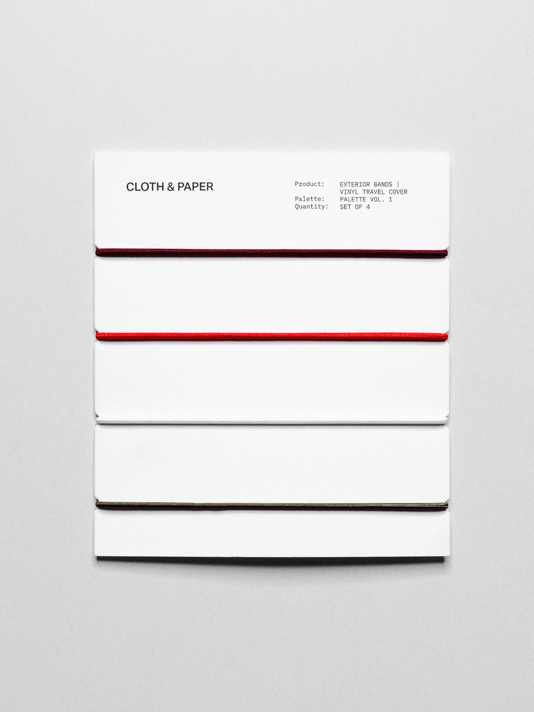 Set of travel bands displayed in their packaging on a neutral background.