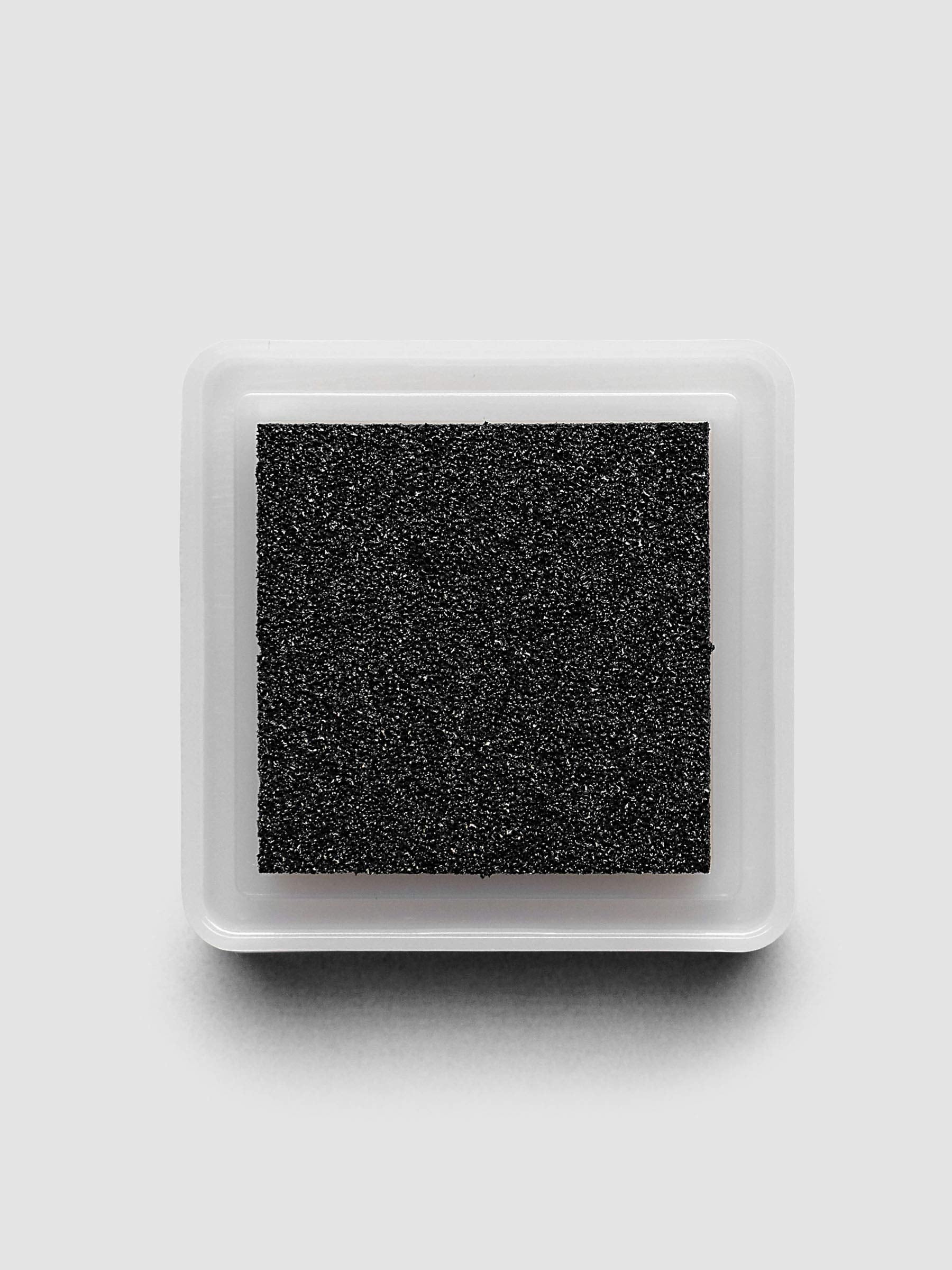 Artnic Stamp Ink Pad in charcoal seen from the side with cover on