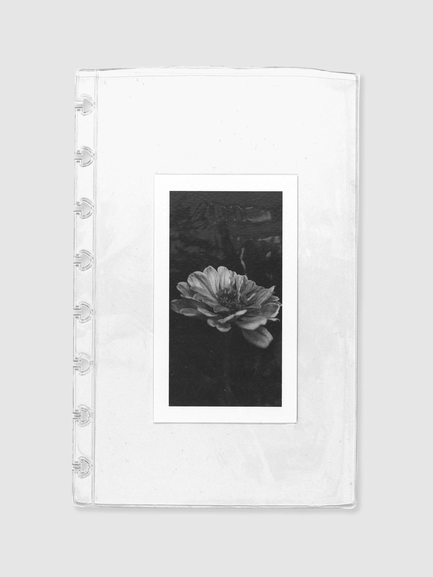Document pocket displayed on a neutral background. A botanical card is displayed inside the pocket. Size shown is Half Letter.