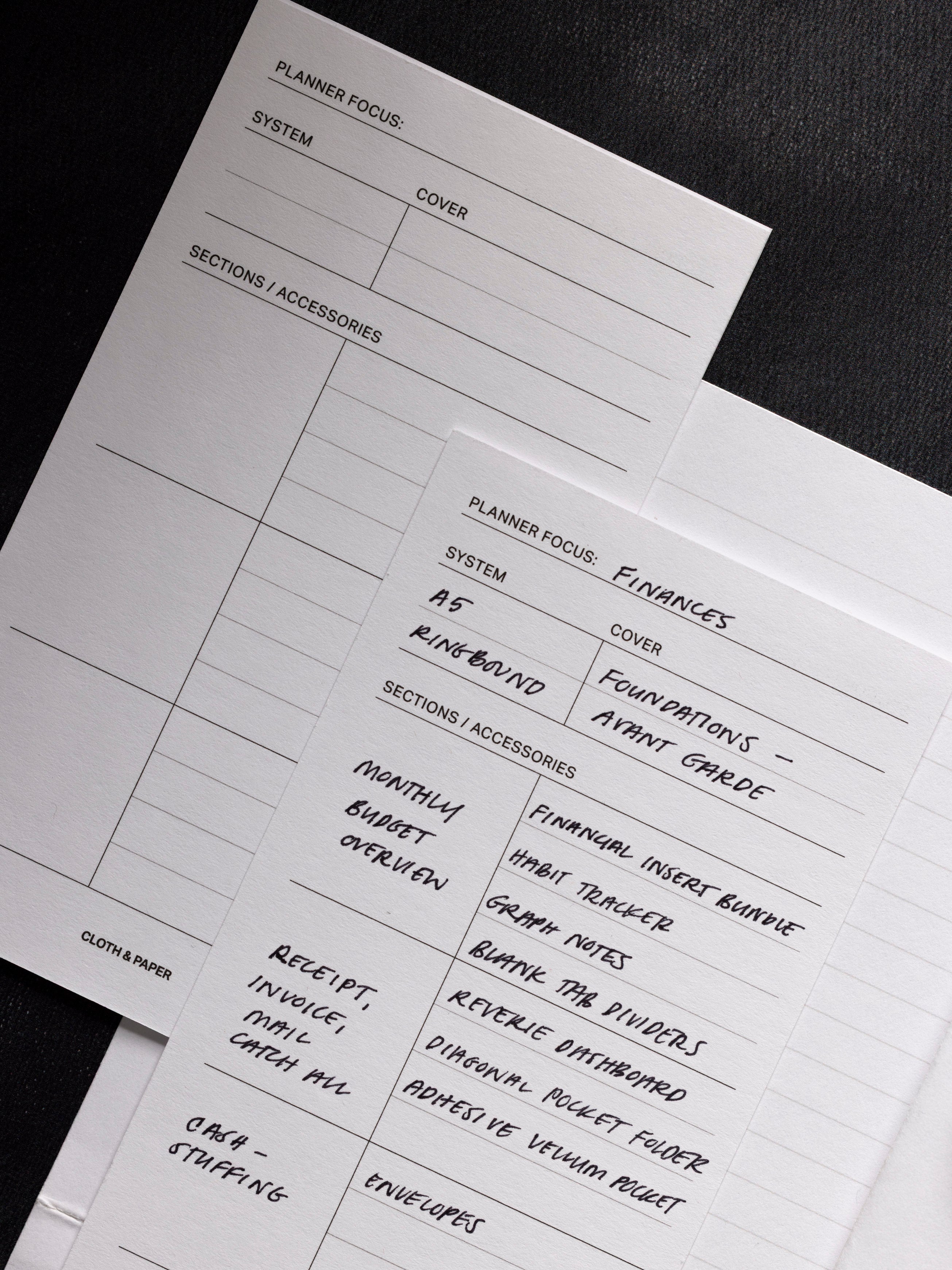 Planner System Card Set shown in use against a black background.