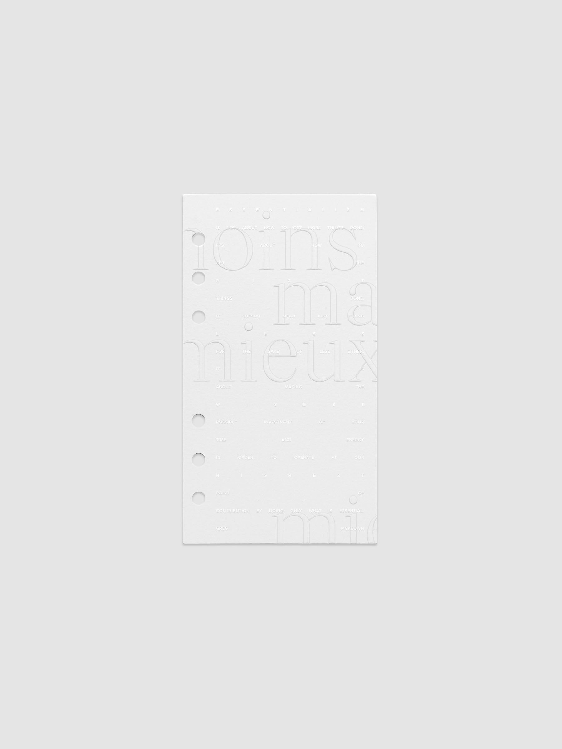 Essentialism Dashboard Duo reading "moins mai mieux" in size Personal.