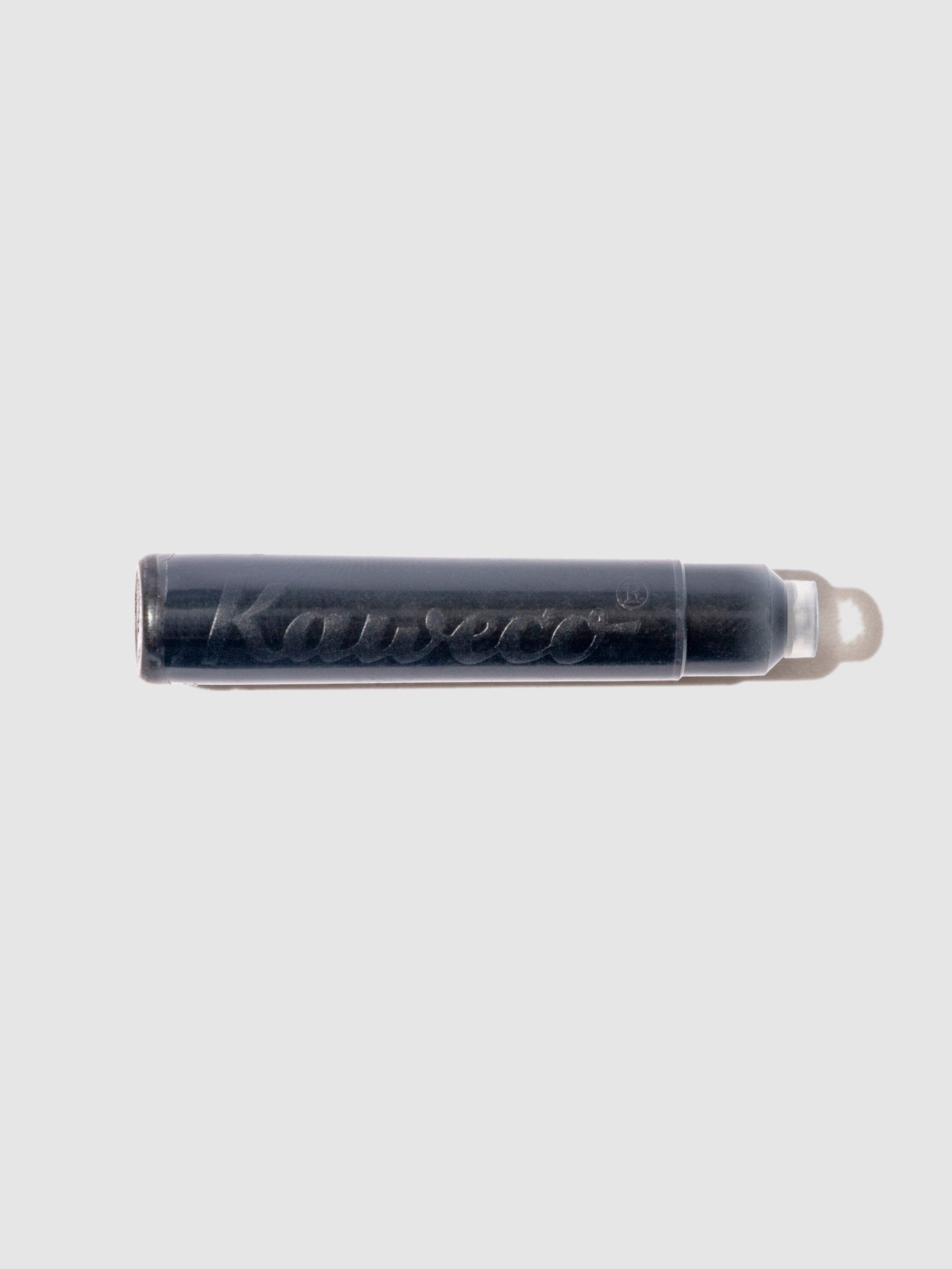 Single cartridge displayed on a neutral background. Color shown is Pearl Black.