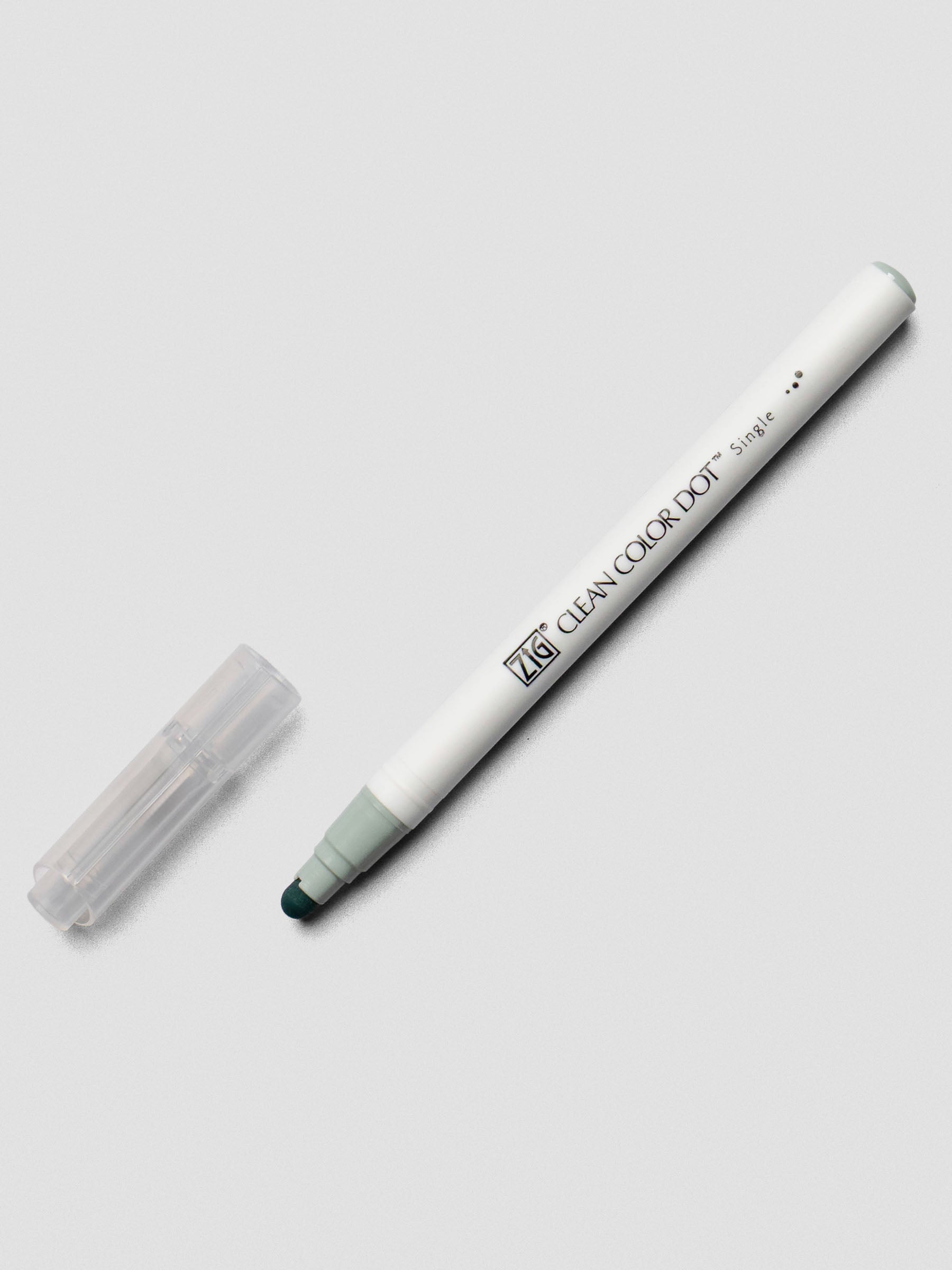 Grayish Green Kuretake ZIG Clean Color Dot Marker shown uncapped at an angle on a light background.