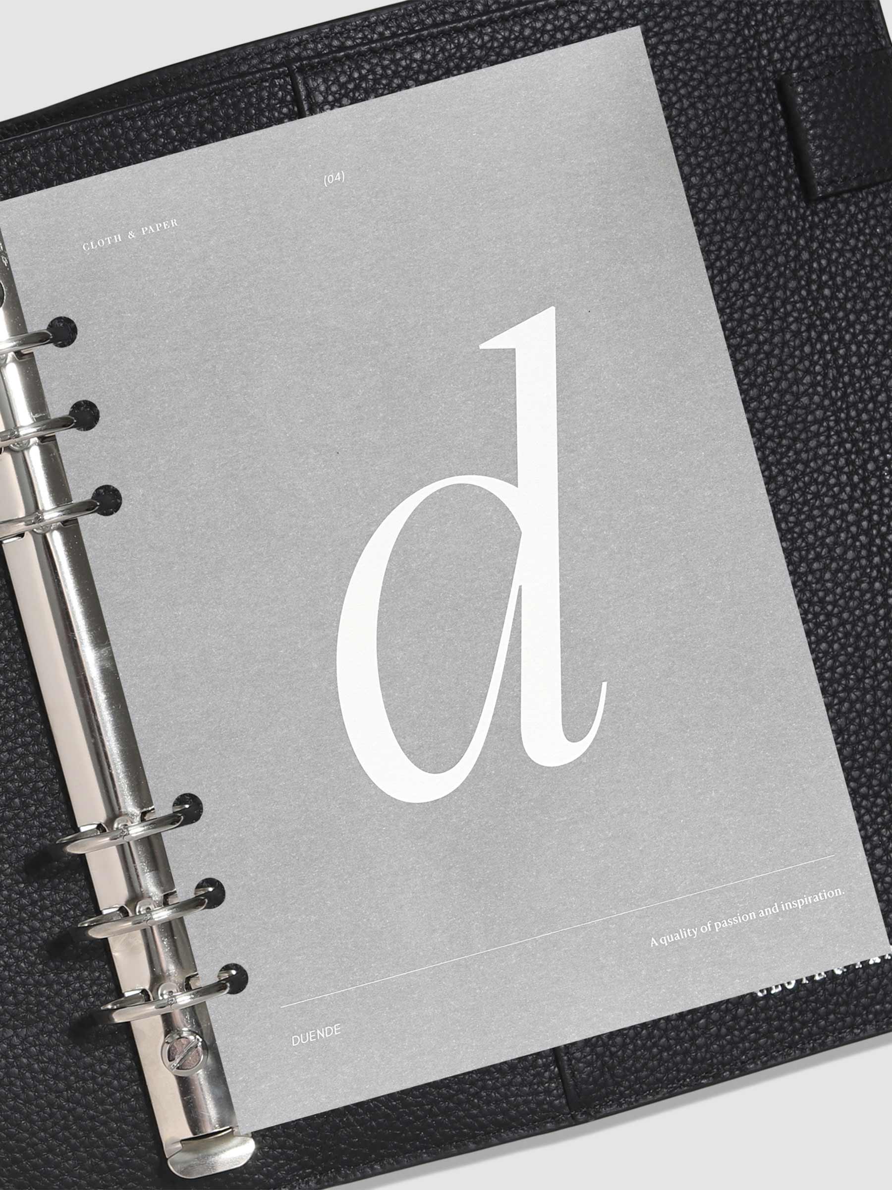 Monogram Vellum Planner Dashboard D in use in a leather planner.
