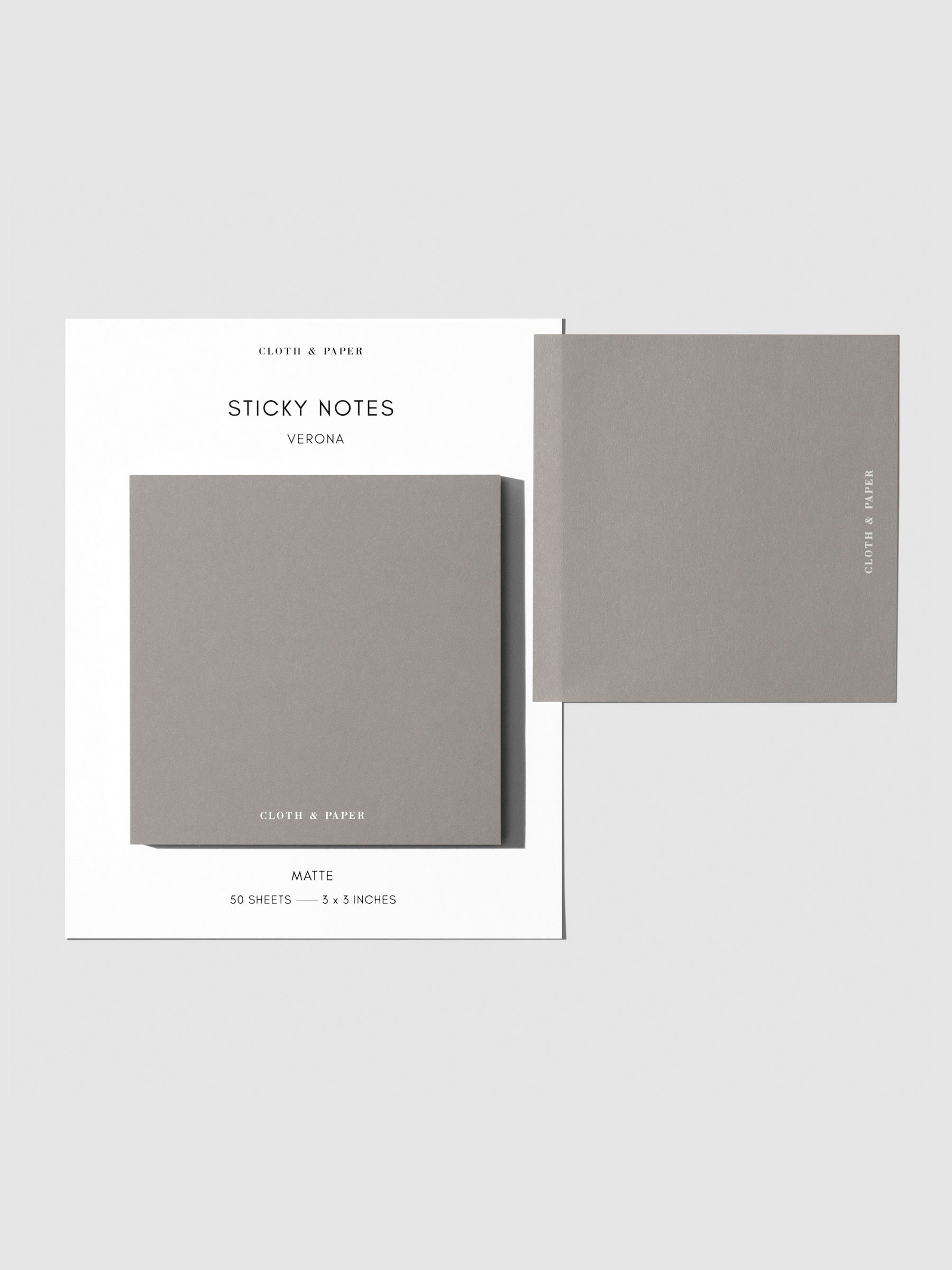 Sticky note set displayed against a neutral background. One note is placed on the packaging's edge. Color shown is Verona.