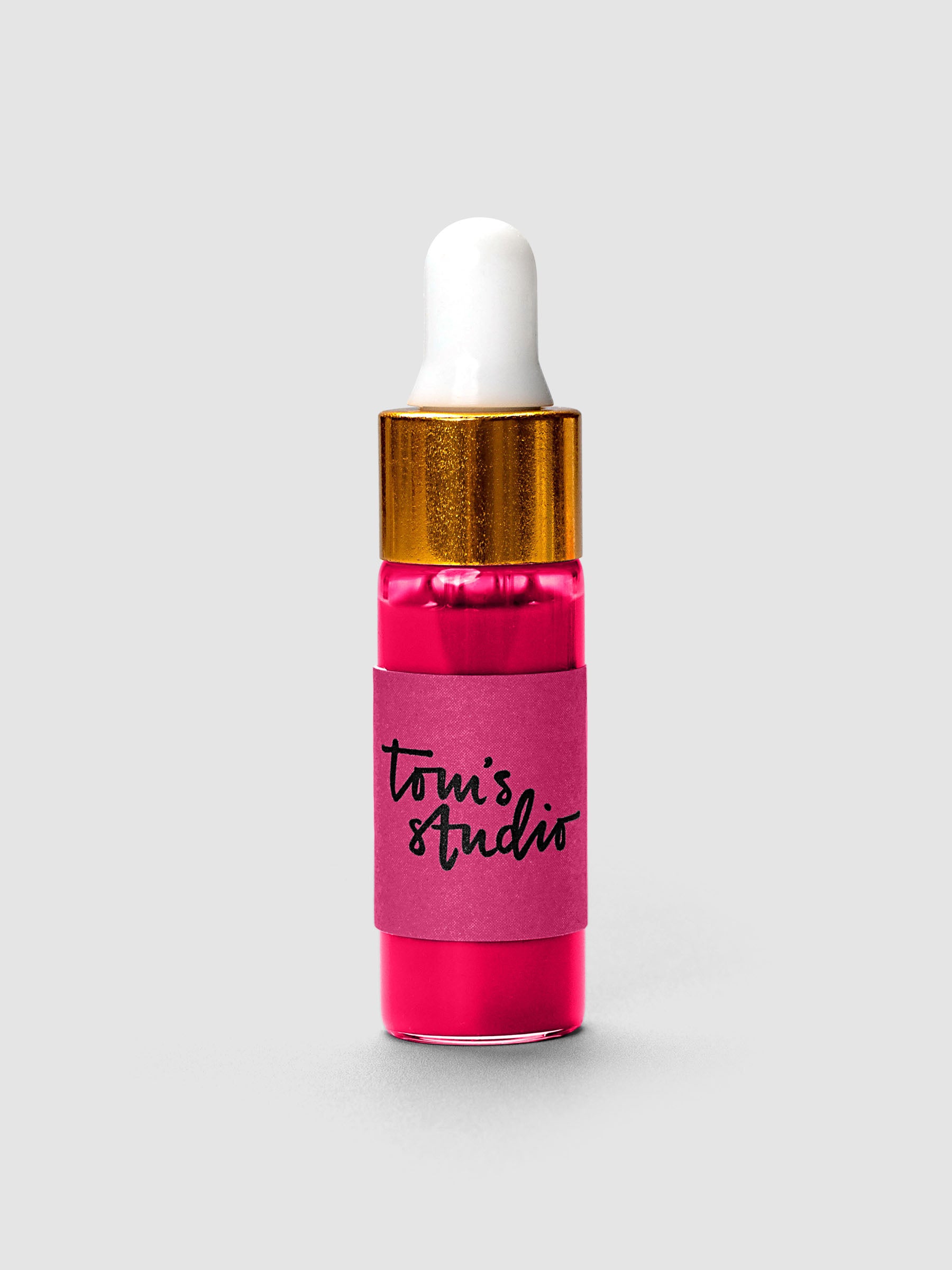 Tom's Studio Mini Highlighter Ink bottle with gold cap and white dropper in pink