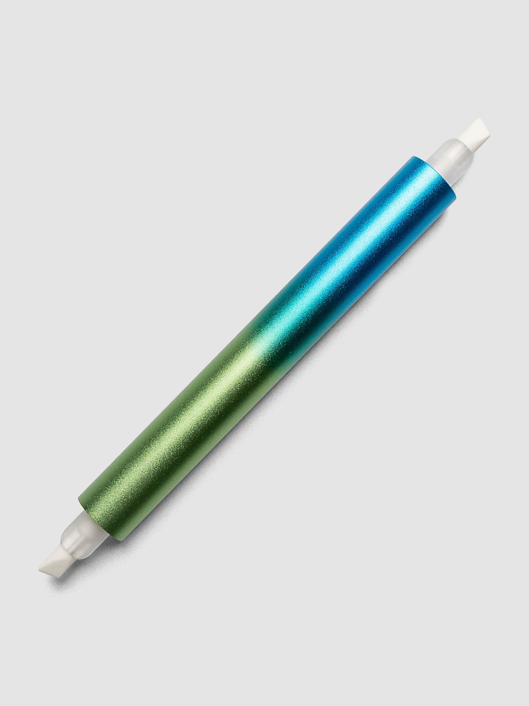 Tom's Studio Ori Refillable Highlighter close up of blue and green ombre barrel with white chisel tip