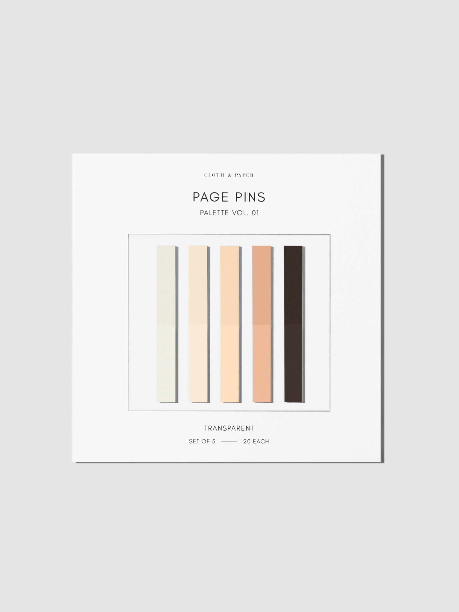Page Pins, Volume 1, Cloth and Paper. Page pins on the backing on a neutral background.