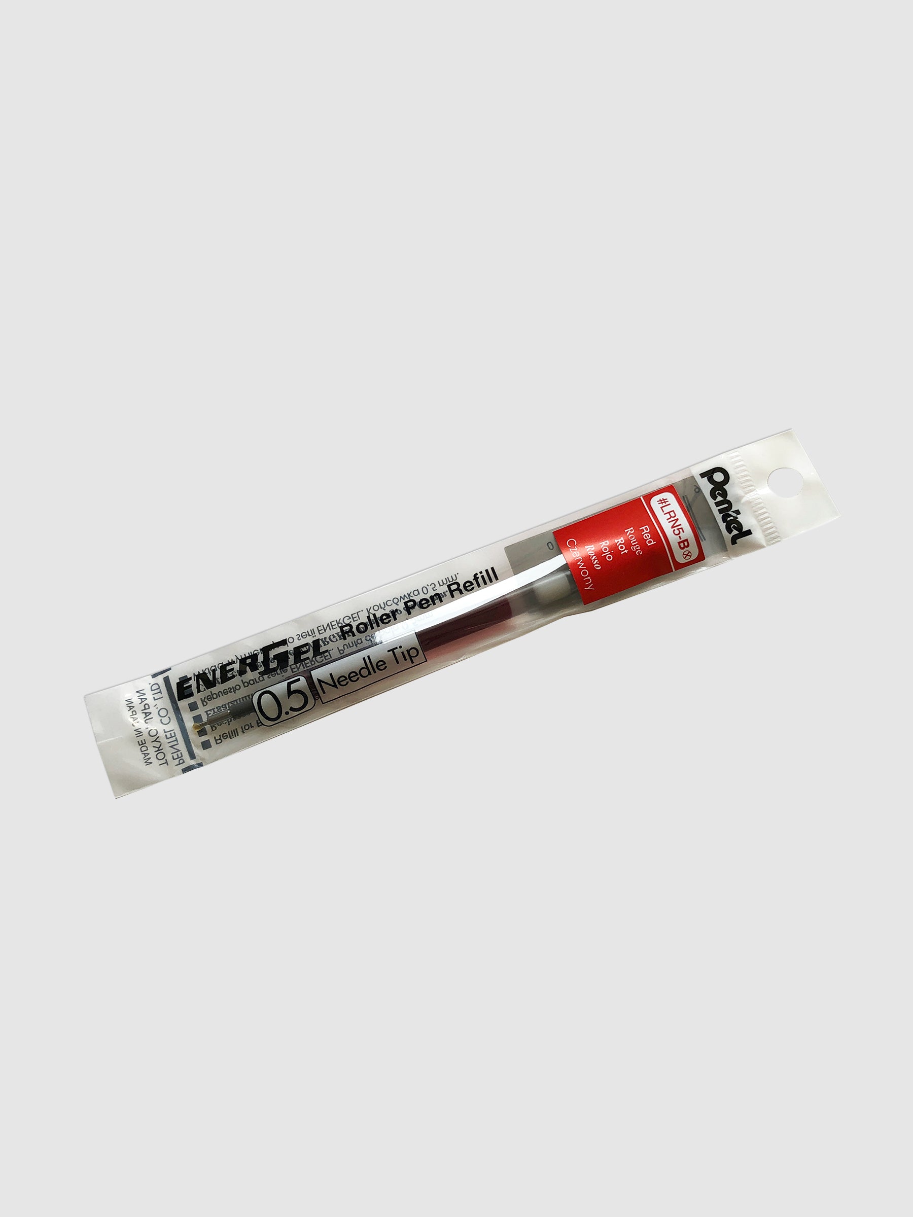 Pentel Energel Refill | Black | Cloth & Paper. Ink refill shown in its packaging tilted to the right on a neutral background.