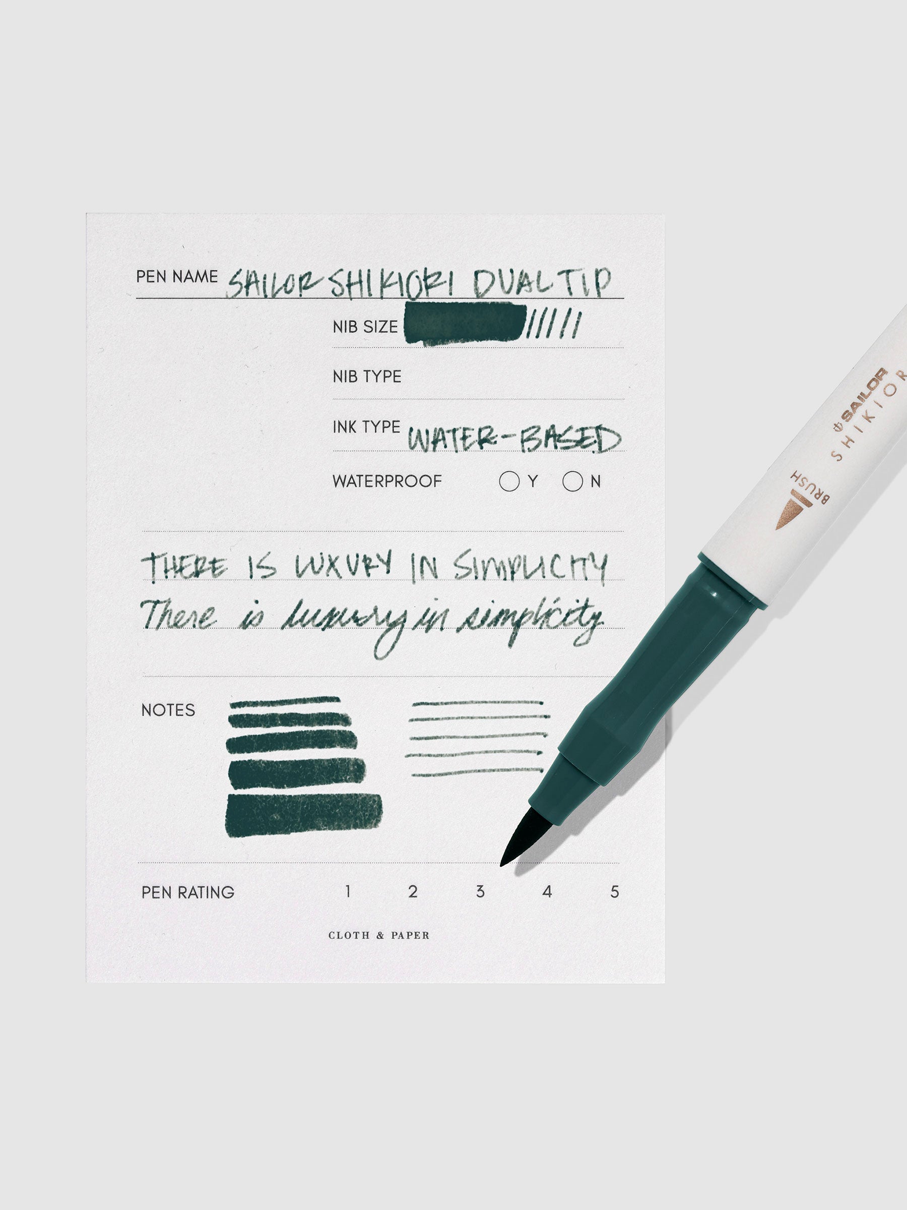 Pen displayed next to in use pen test sheet. Color pictured is Miruai.