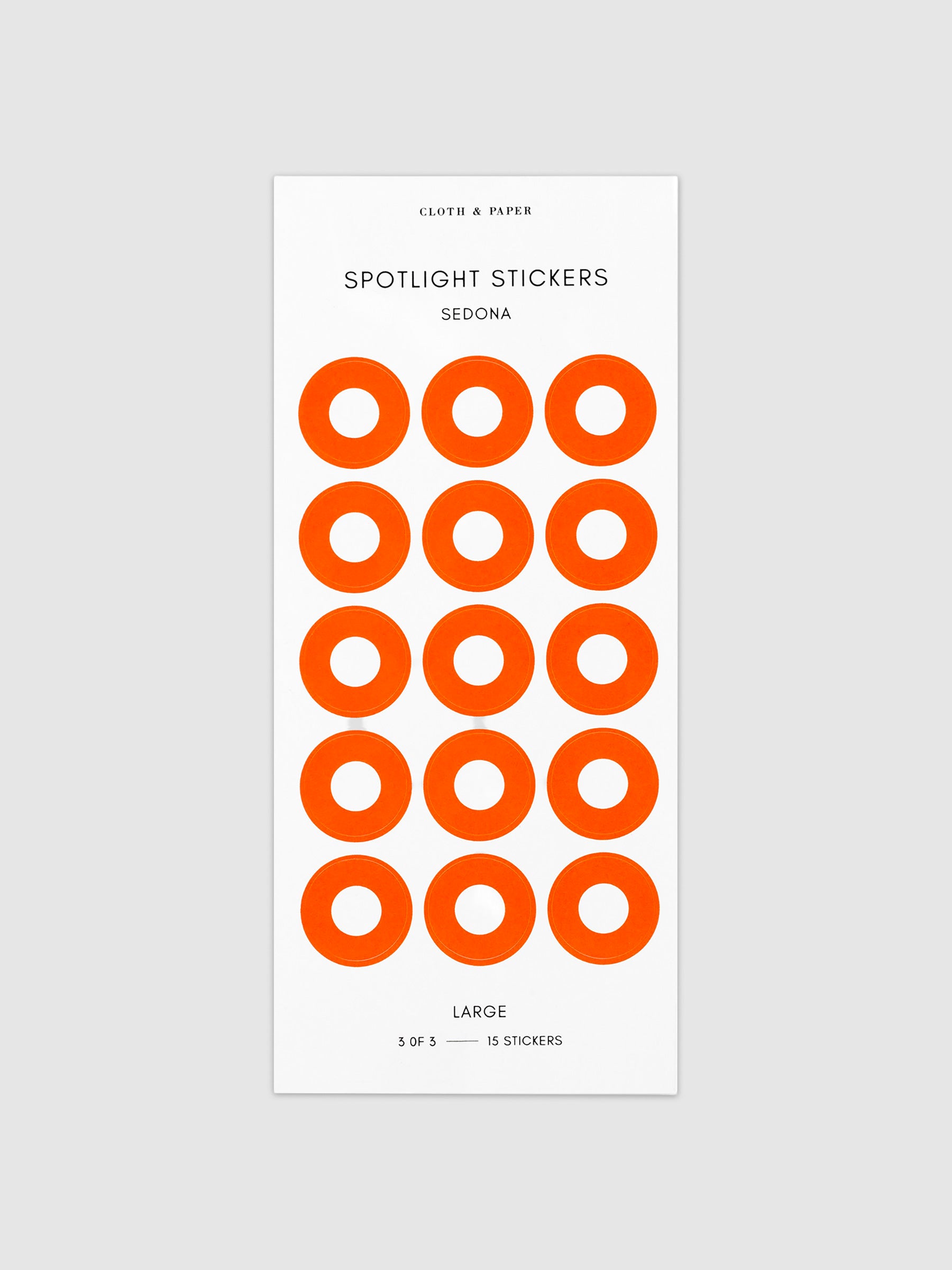 Large sticker in its packaging displayed on a neutral background. Pictured color is sedona.