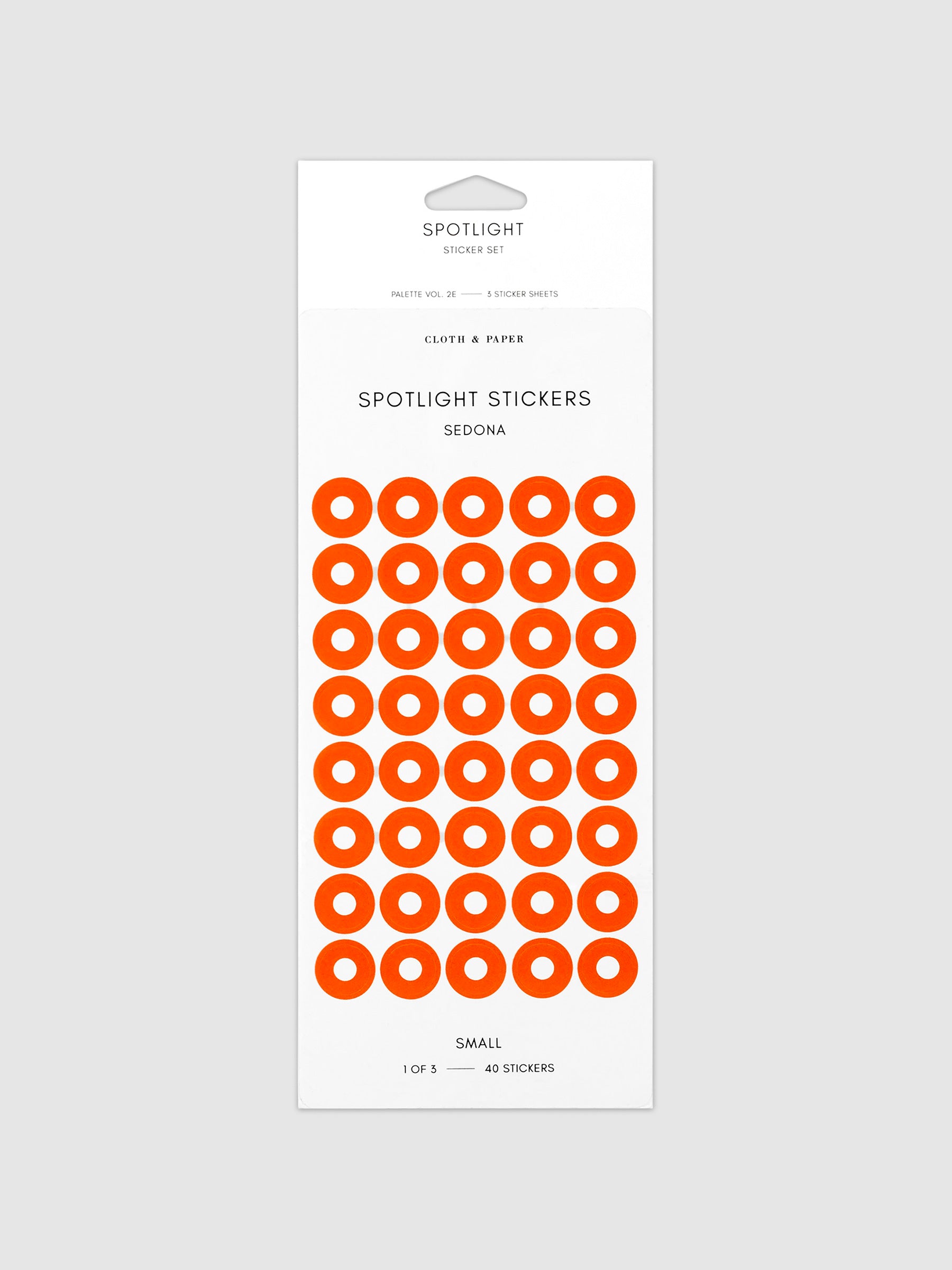 Small sticker in its packaging displayed on a neutral background. Pictured color is sedona.