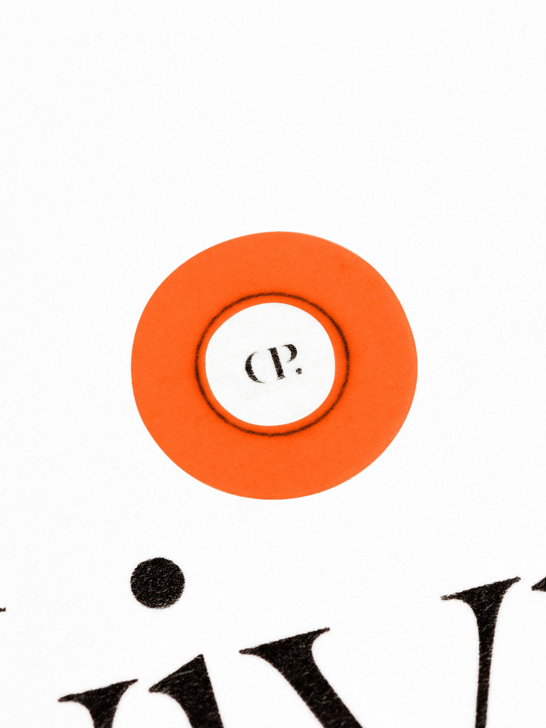 Small sticker in use, placed over the Cloth and Paper logo on a sheet of paper.