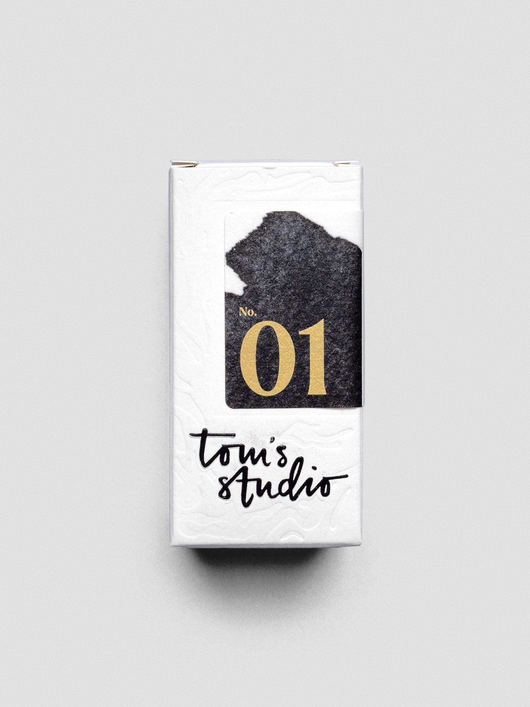 Close-up of Tom’s Studio Fountain Pen Ink in Deep Black, highlighting dark tone.