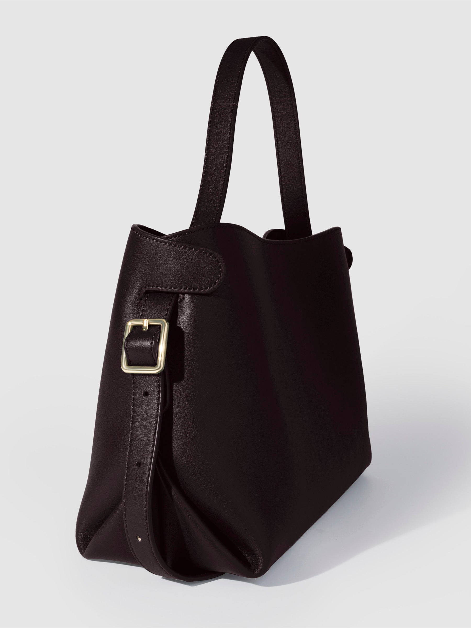 Bag shown from a three-quarter angle on a neutral background. Color shown is Madrid.