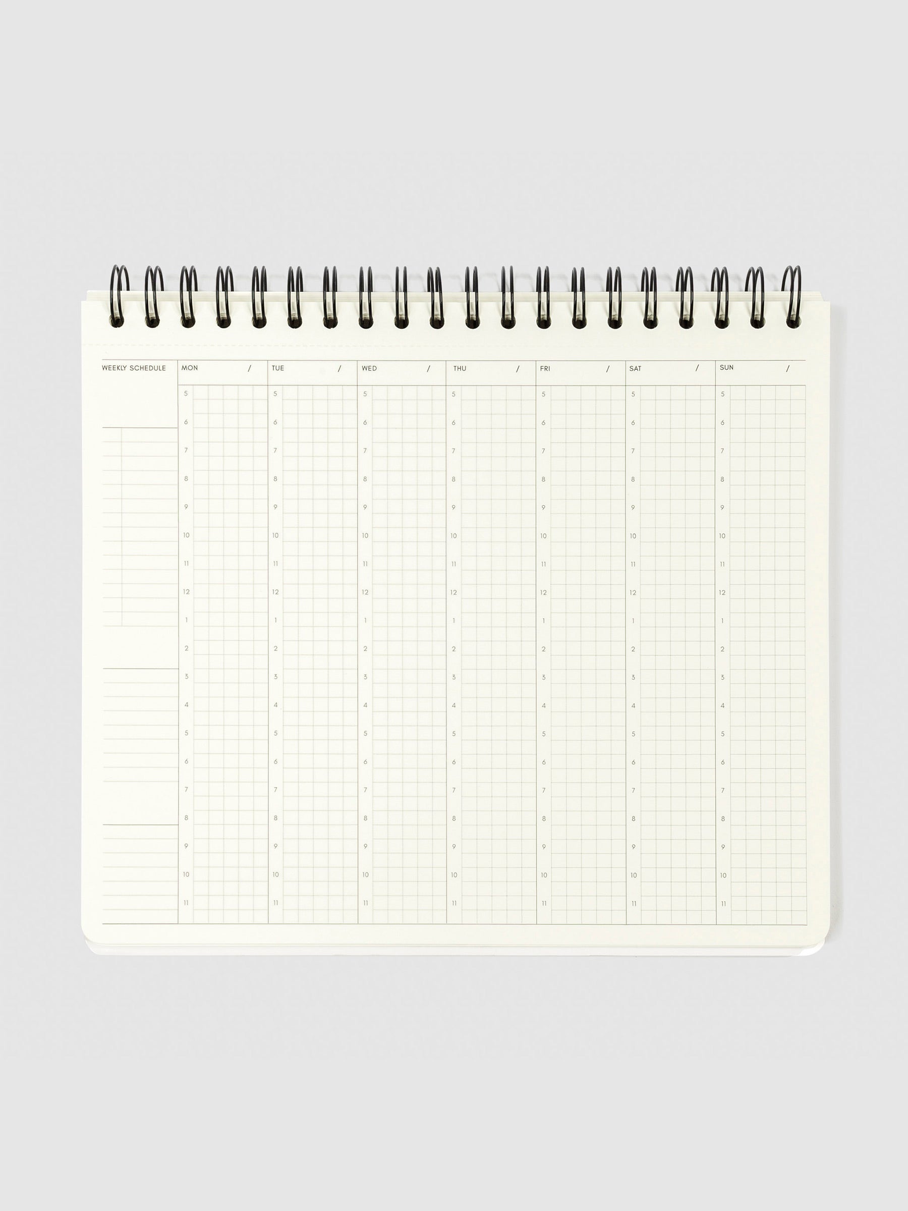 Weekly schedule page displayed on a neutral background. There are fields for Monday through Sunday. On the left side of the page, there are fields for a checklist and two notes sections.