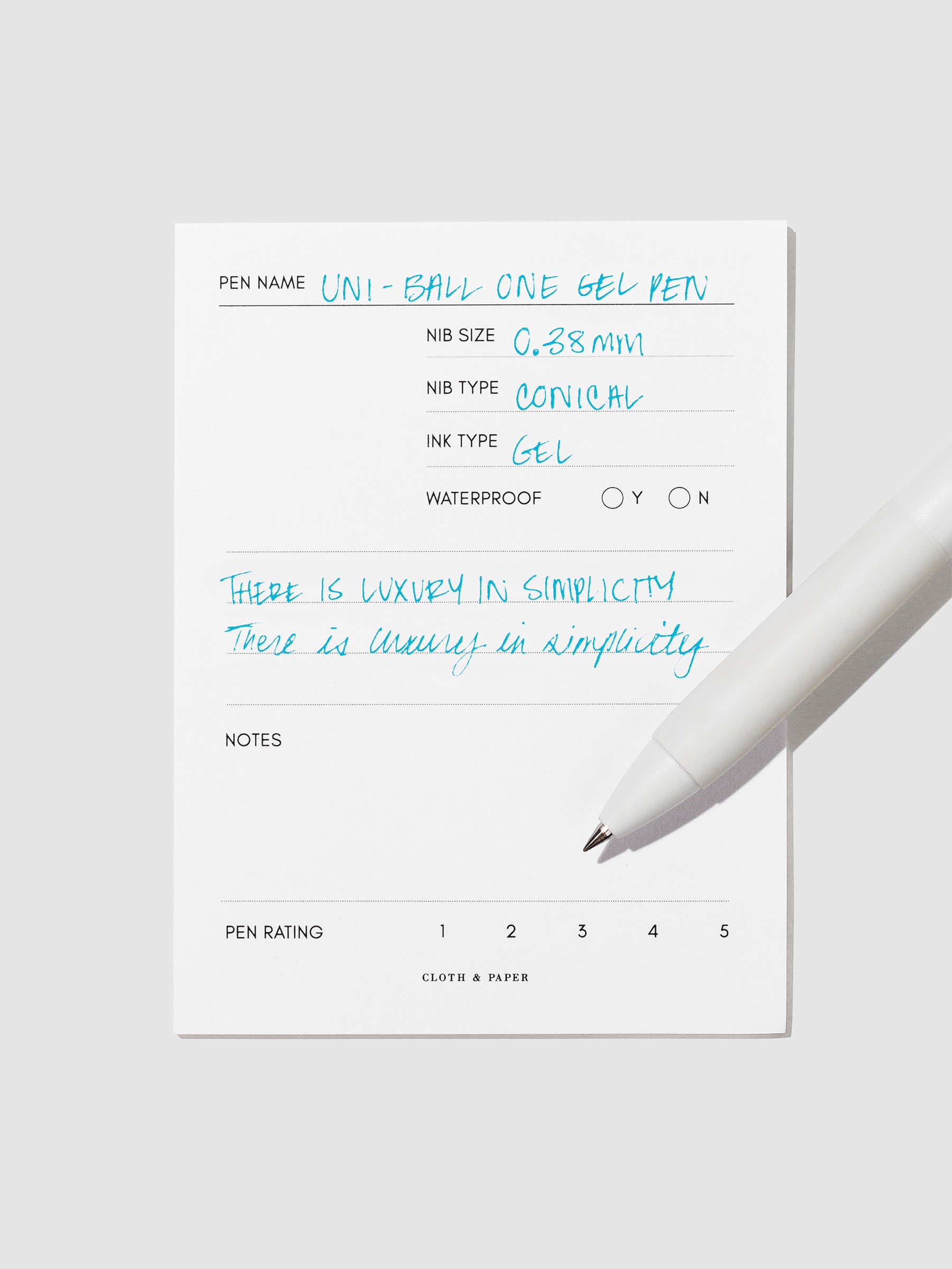 Pen tilted slightly to the right on a neutral background. Color pictured is Sky Blue.