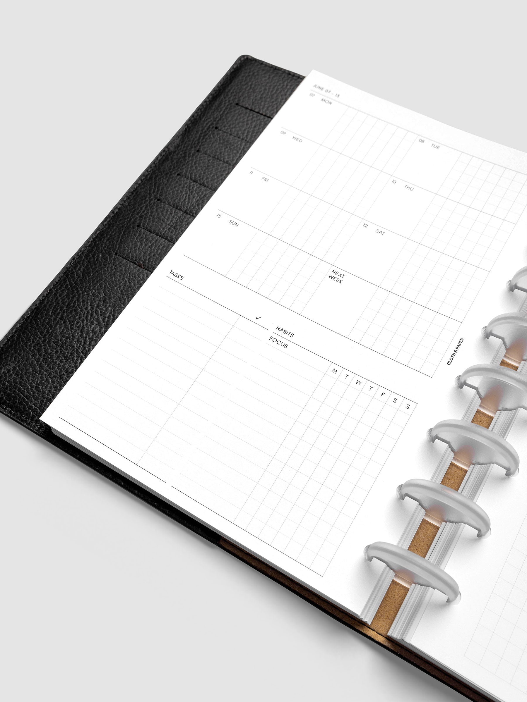 Close-up of the 2027 Dated Weekly Admin left page in Half Letter 8-Disc Punch size, showing the habit tracking section