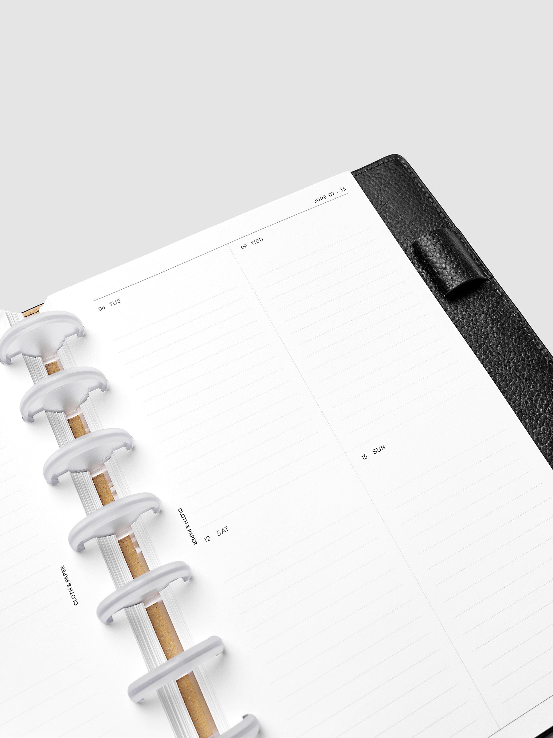 2027 Dated Weekly Vertical Planner Inserts, Monday Start, Half Letter 8-Disc Punch, close-up of the top of the right page showing the upper daily grid sections with lined areas for notes and appointments