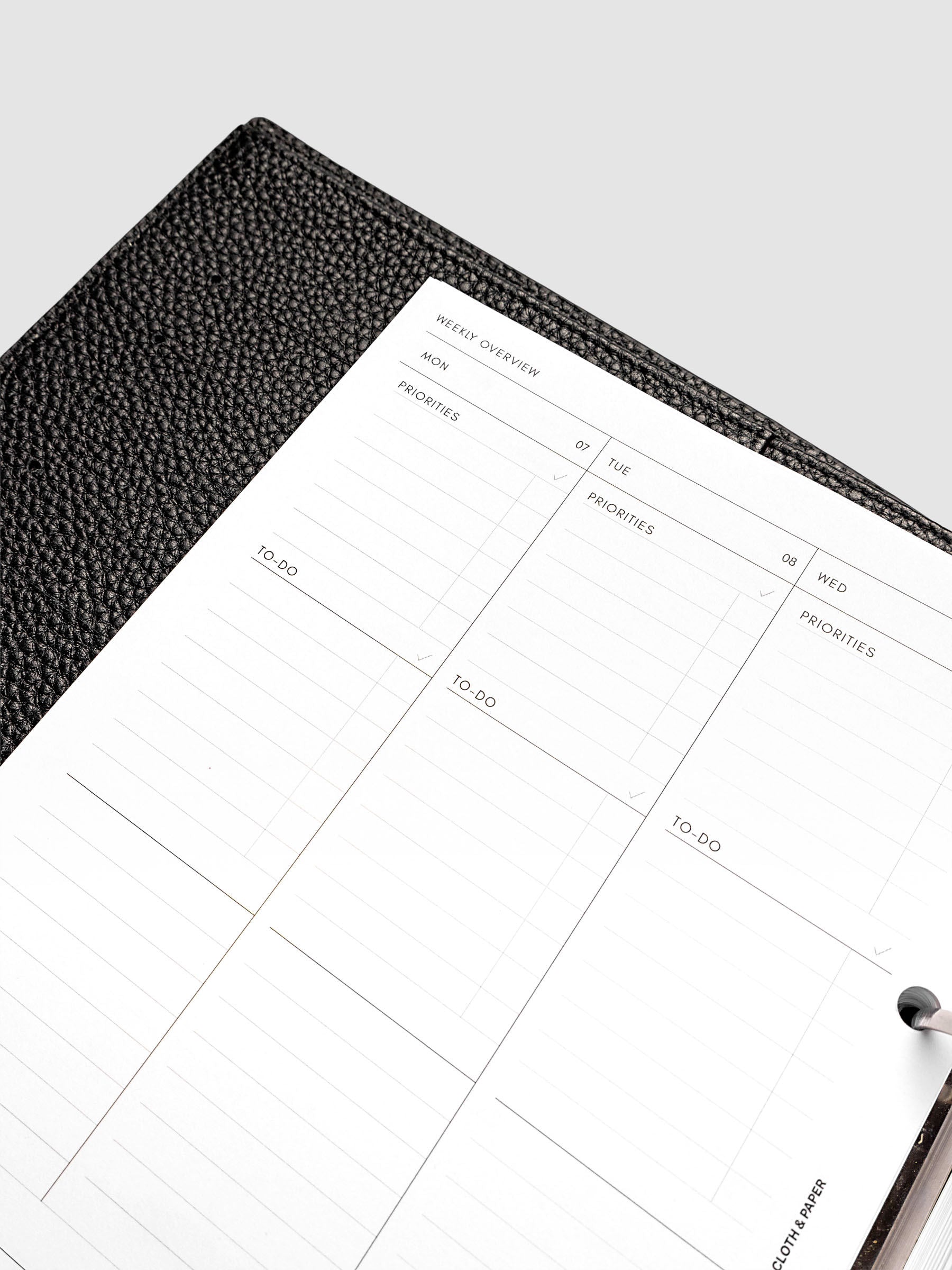 2027 Dated Weekly Task Planner Inserts, Monday Start, A5 6-Ring Punch, close-up of the top of the left page showing labeled priorities and to-do sections at the top of each weekday column